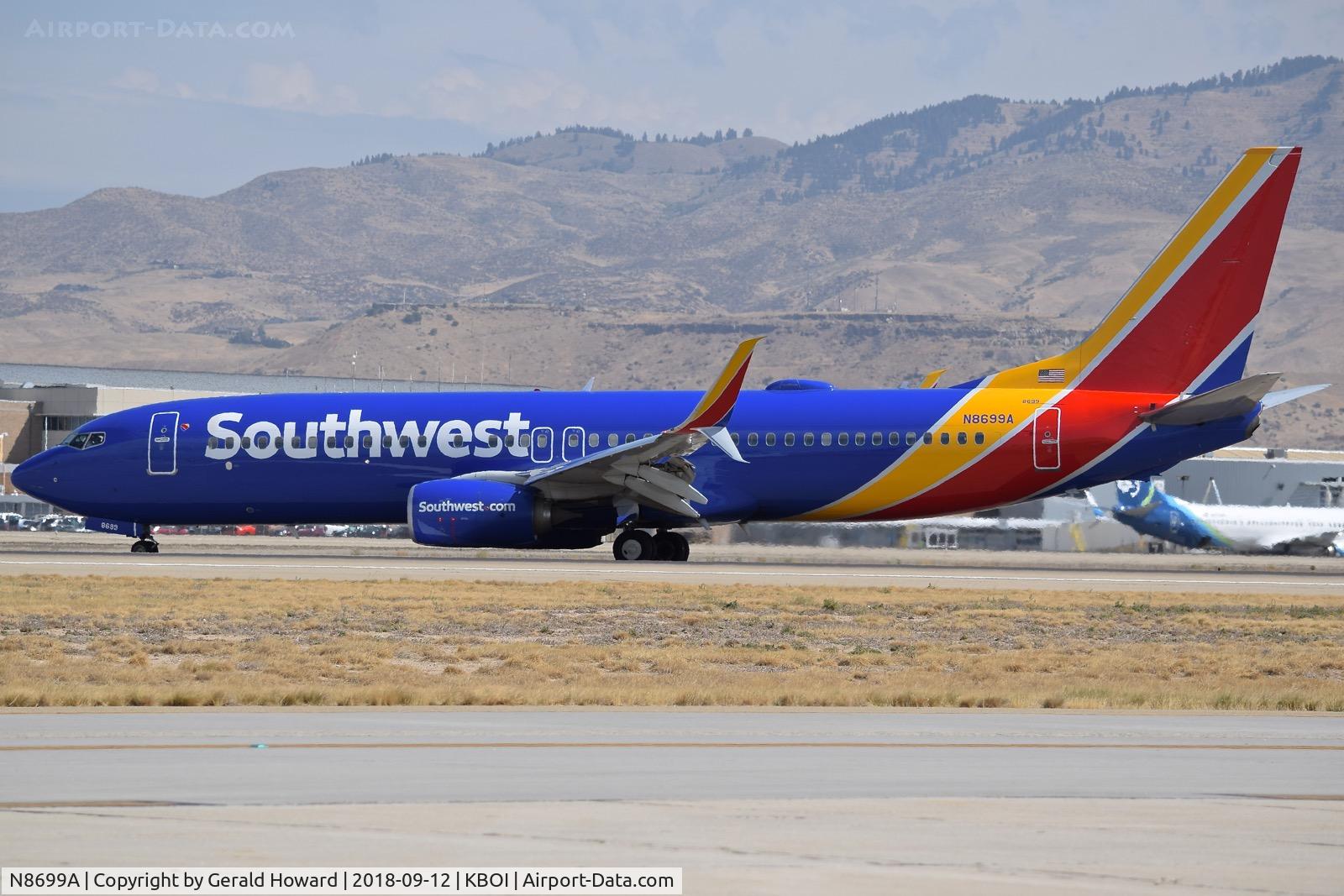 N8699A, 2016 Boeing 737-8H4 C/N 36923, Turning off RWY 28L.
