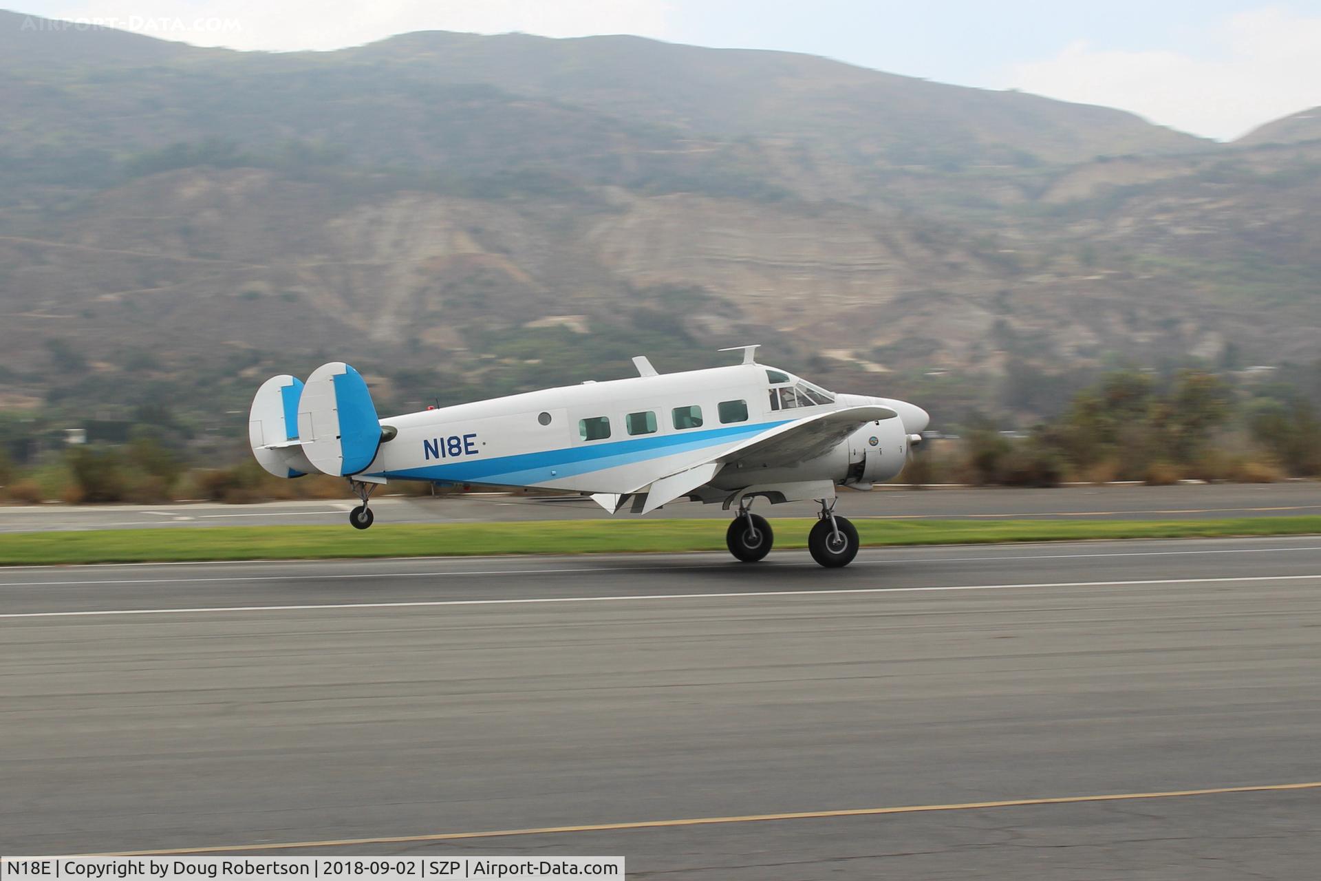 N18E, 1958 Beech E18S C/N BA-383, 1958 Beech SUPER E18S, two Pratt & Whitney R985 450 Hp Wasp Jrs., landing roll Rwy 22. Frequent First Sunday visitor from high desert