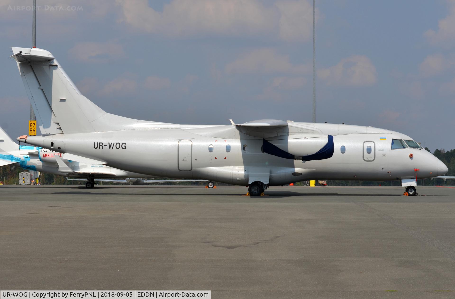 UR-WOG, 1999 Fairchild Dornier 328-300 328JET C/N 3118, AeroStar DO328J at the FAI Apron in NUE