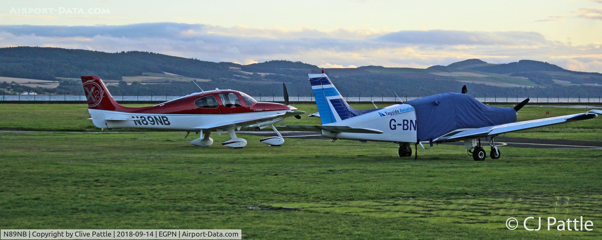 N89NB, Cirrus SR22X C/N 3680, Parked up at Dundee alongside a resident PA-28
