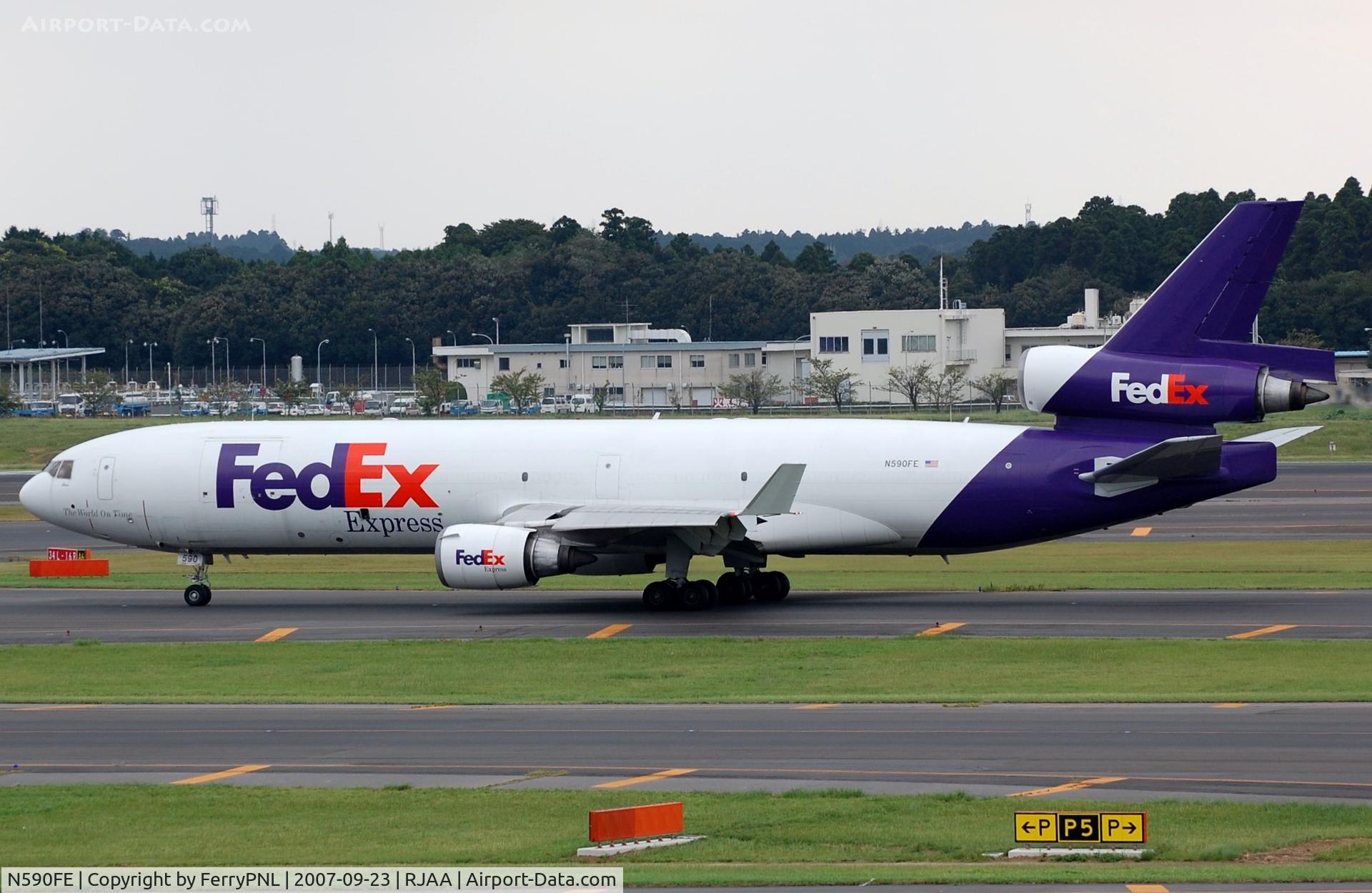 N590FE, 1991 McDonnell Douglas MD-11F C/N 48505, Fedex MD11 passing by