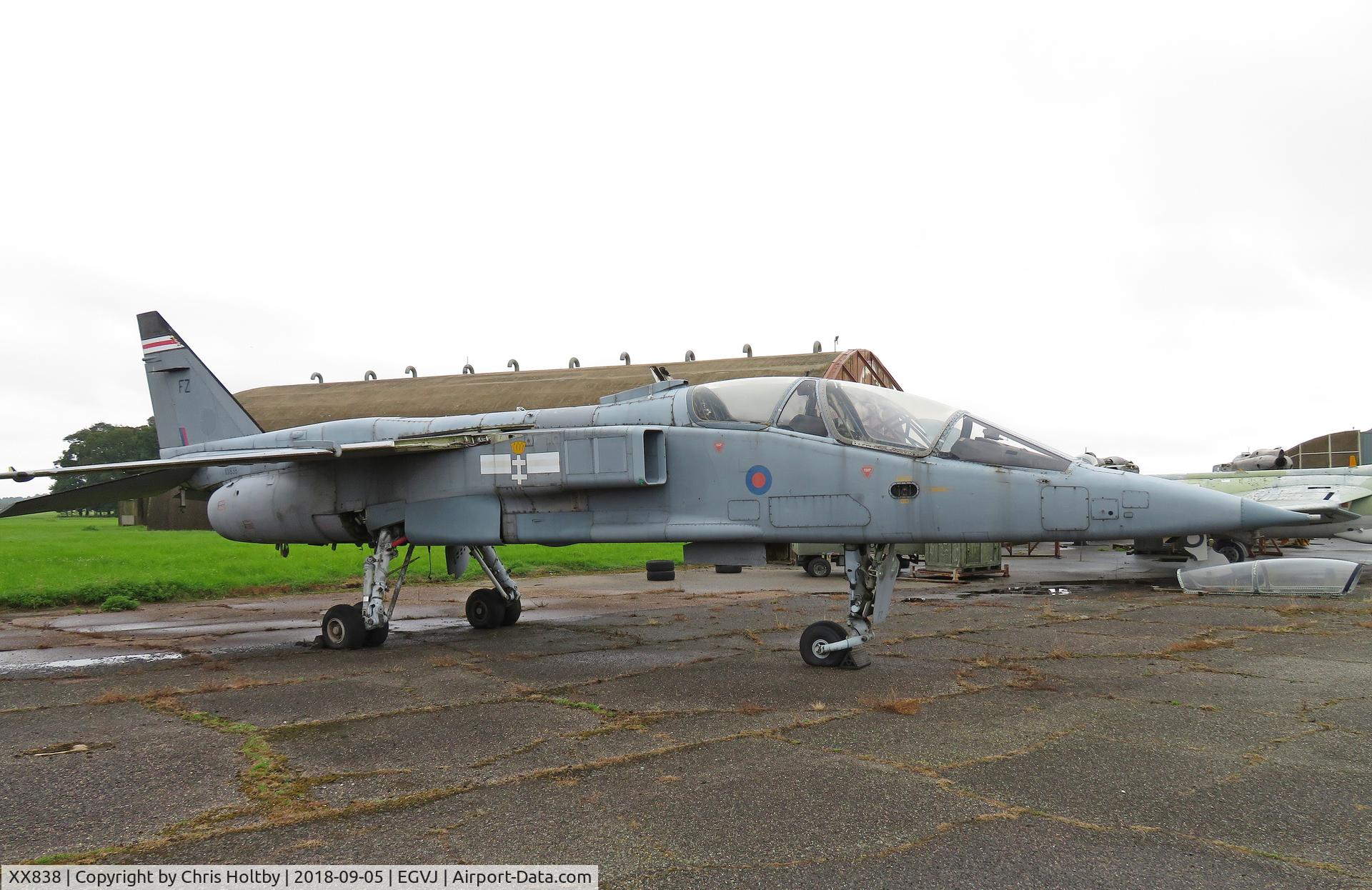 XX838, 1975 Sepecat Jaguar T.4 C/N B26, Showing signs of deterioration stored outside at ex-RAF Bentwaters