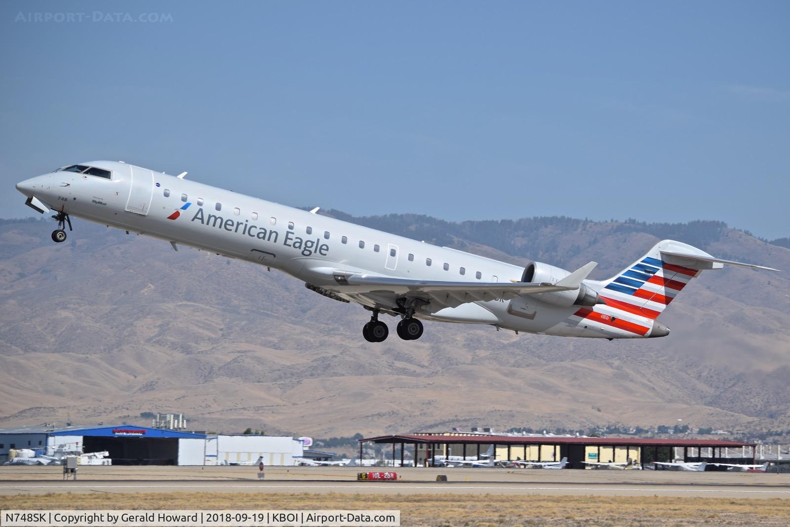 N748SK, 2005 Bombardier CRJ-700 (CL-600-2C10) Regional Jet C/N 10203, Departing RWY 28L.