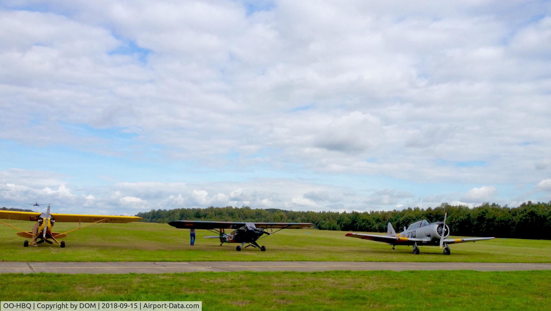 OO-HBQ, Piper L-18C Super Cub (PA-18-95) C/N 18-3130, OO- HBQ is parked close to another Cub J3 (OO-YOL-1944) and T6 Harvard (mid-50's). EBBT airfield.