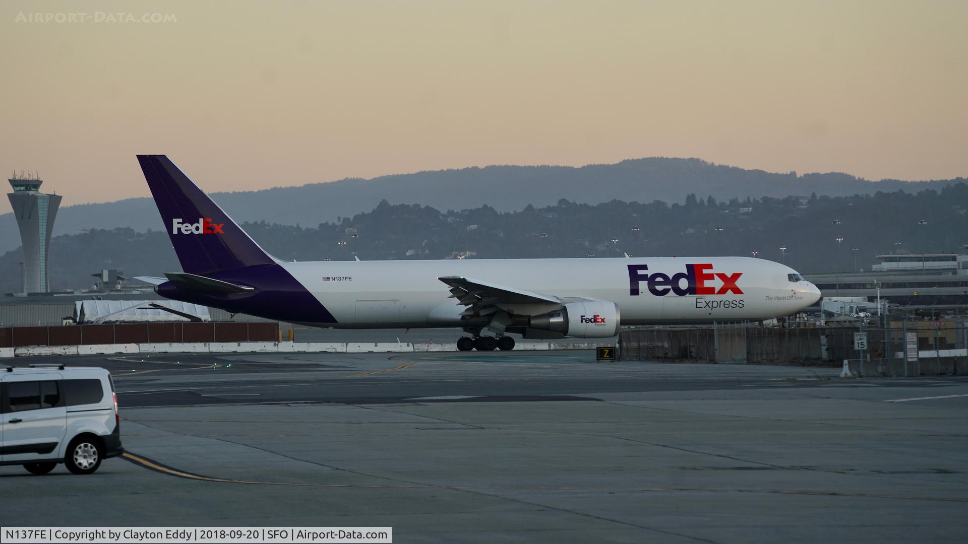 N137FE, 2016 Boeing 767-3S2F/ER C/N 61206, Night departure. SFO. 2018.