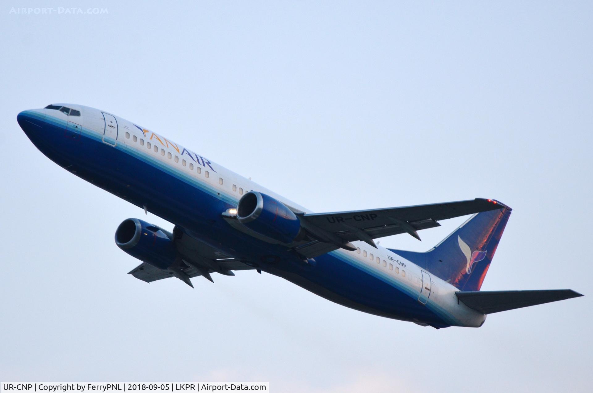 UR-CNP, 1988 Boeing 737-4Y0 C/N 23980, Yan Air B734 departing just before dusk