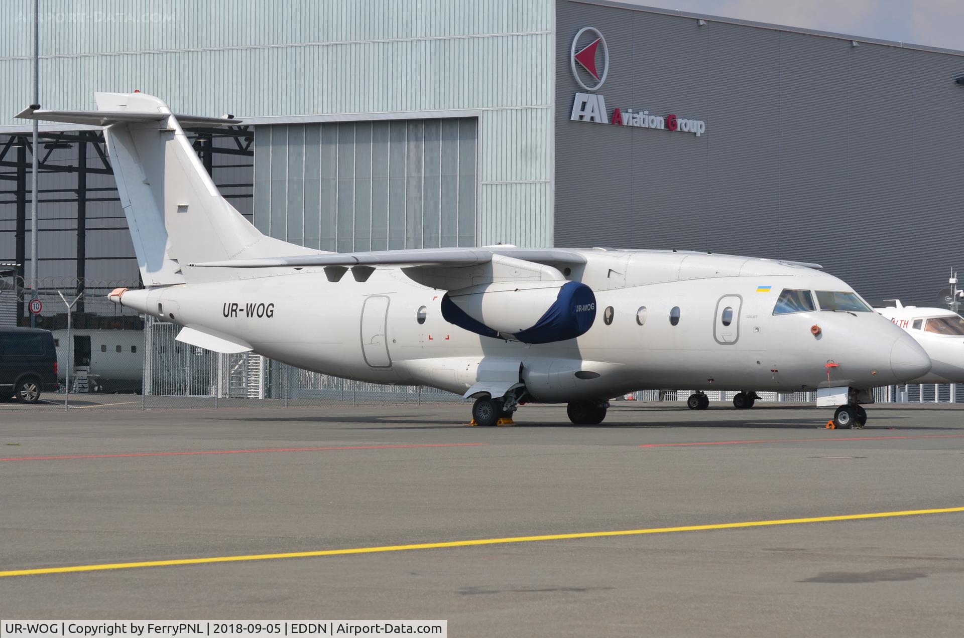 UR-WOG, 1999 Fairchild Dornier 328-300 328JET C/N 3118, Do328 parked at NUE