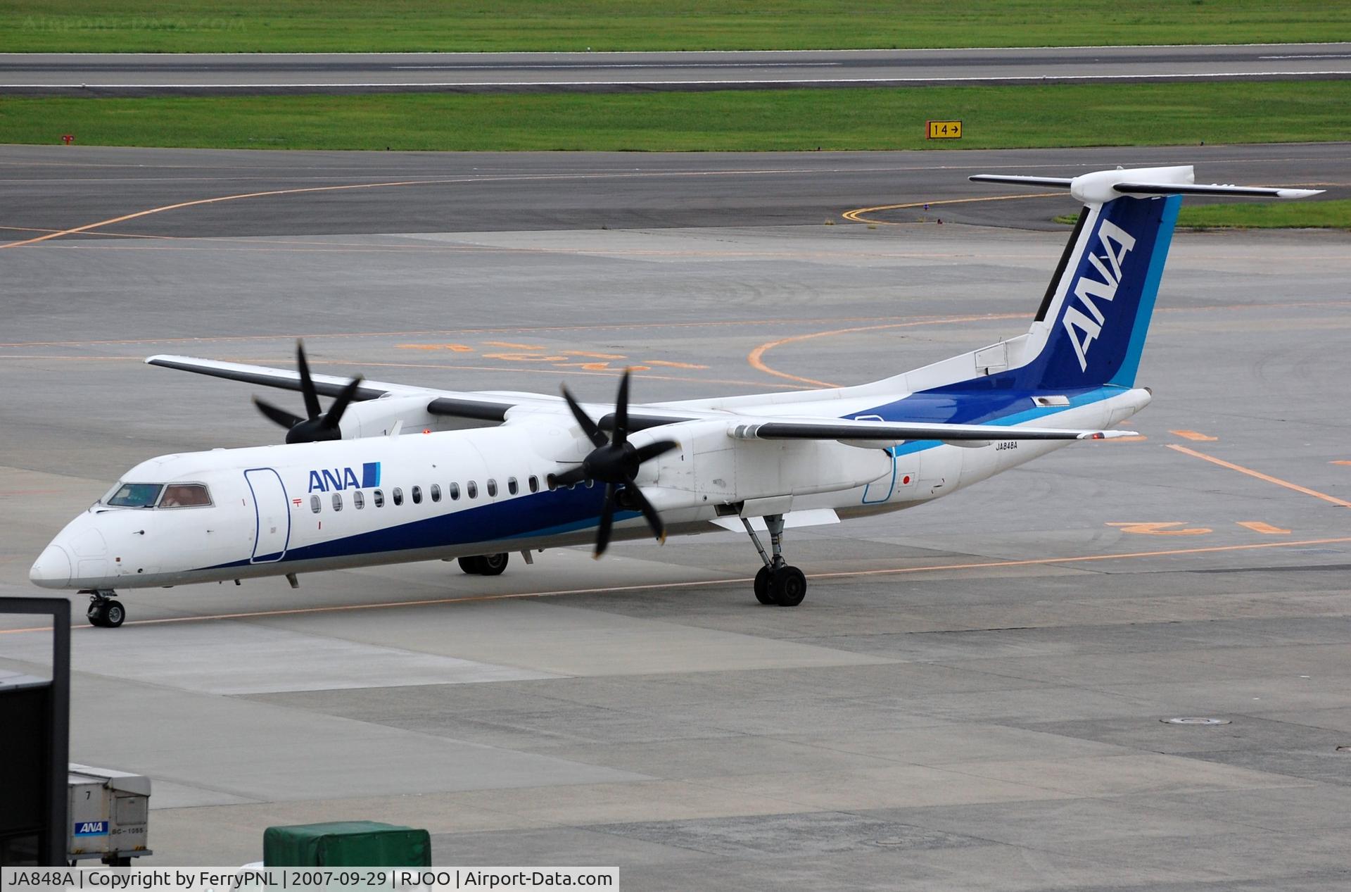 JA848A, 2005 De Havilland Canada DHC-8-402Q Dash 8 C/N 4102, ANA DHC8 arriving at its gate