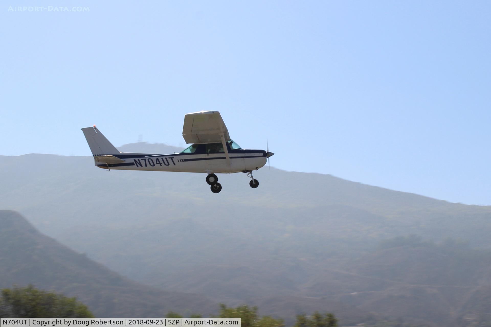 N704UT, 1976 Cessna 150M C/N 15078891, 1976 Cessna 150M, Continental O-200 100 Hp, takeoff climb Rwy 22