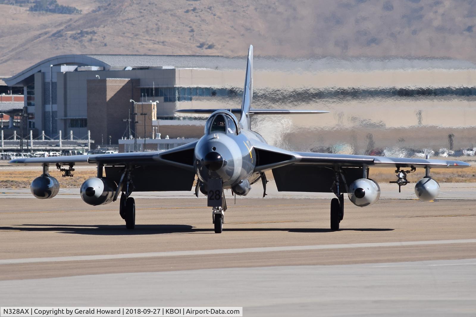 N328AX, 1958 Hawker Hunter Mk.58 C/N 41H-697398, Taxiing off Bravo to the sough GA ramp.