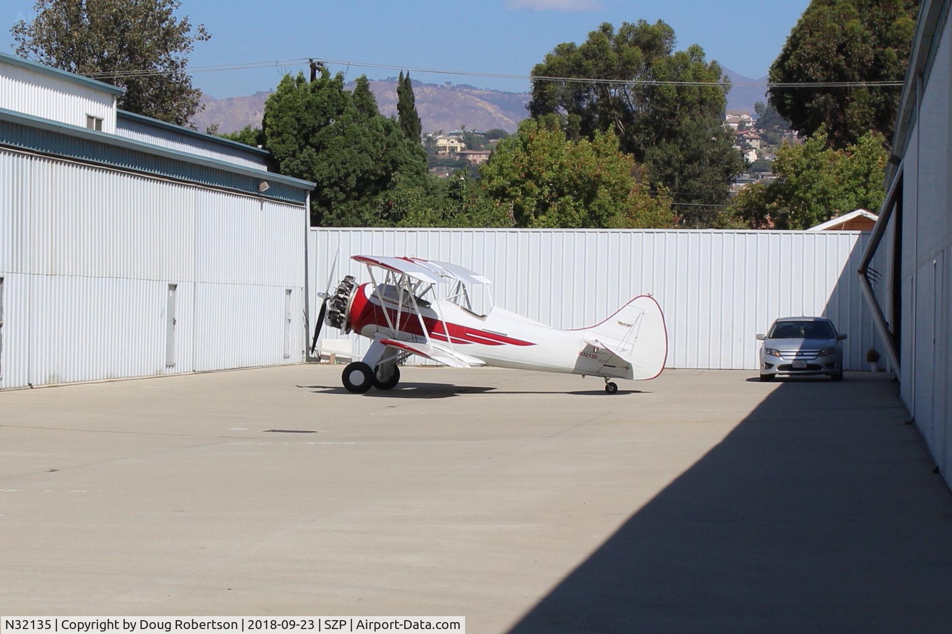 N32135, 1941 Waco UPF-7 C/N 5767, 1941 Waco UPF-7, Continental W670 220 Hp radial, chromed prop & spinner, one of the prettiest classic biplanes, at hangar ramp