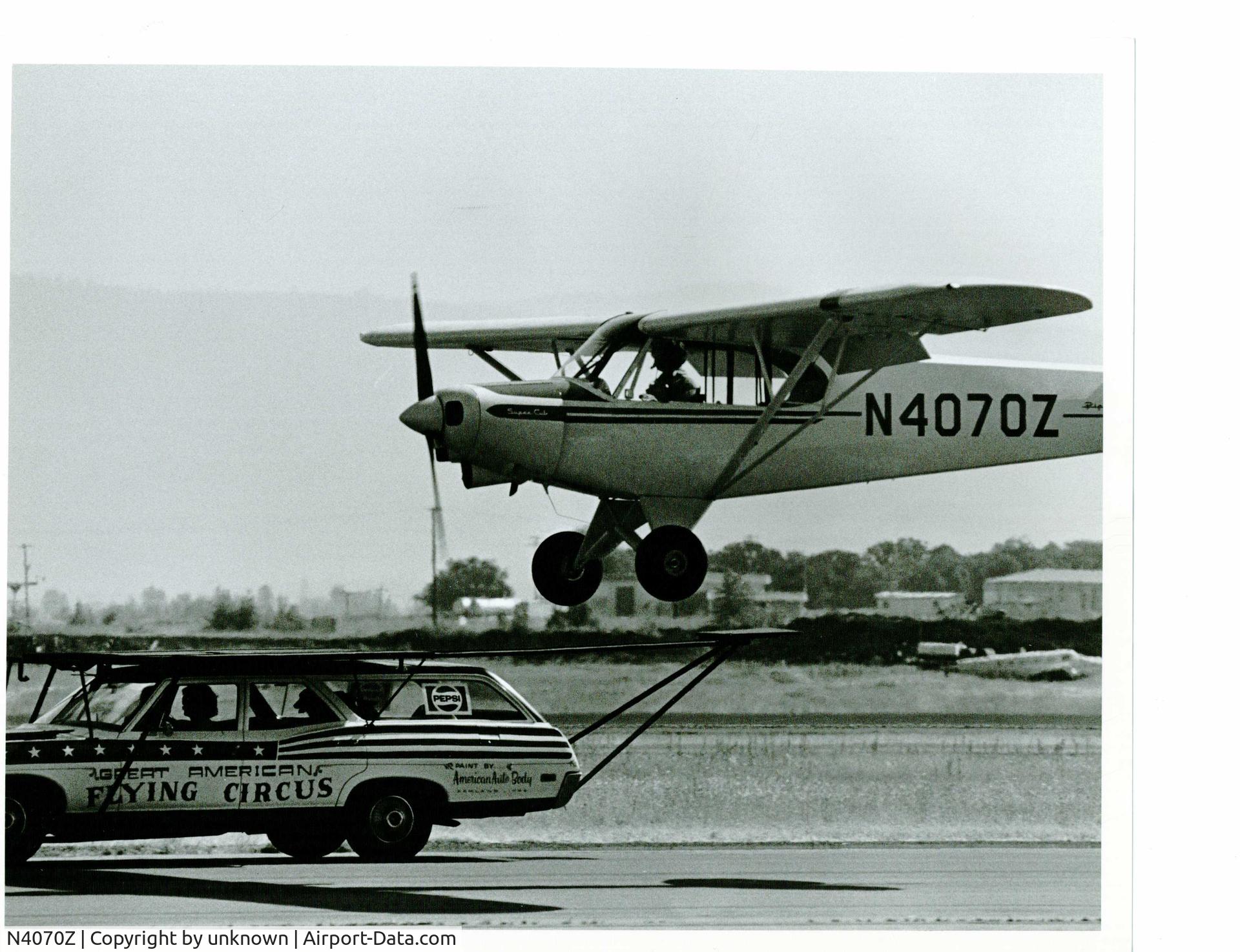 N4070Z, 1964 Piper PA-18-150 Super Cub C/N 18-8081, Bill Warren’s cub landing on a car