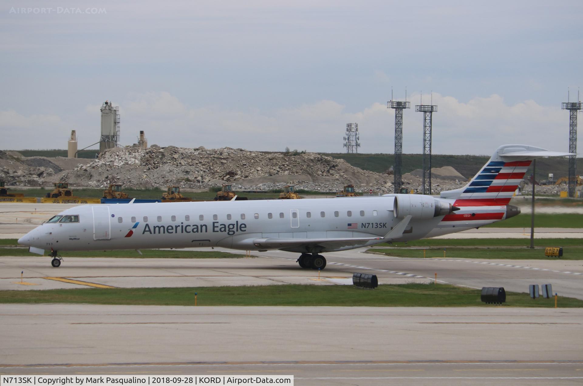 N713SK, 2004 Bombardier CRJ-701ER (CL-600-2C10) Regional Jet C/N 10174, CL-600-2C10
