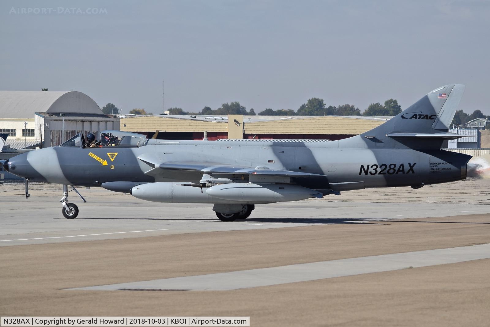 N328AX, 1958 Hawker Hunter Mk.58 C/N 41H-697398, Taxiing to the south GA ramp.
