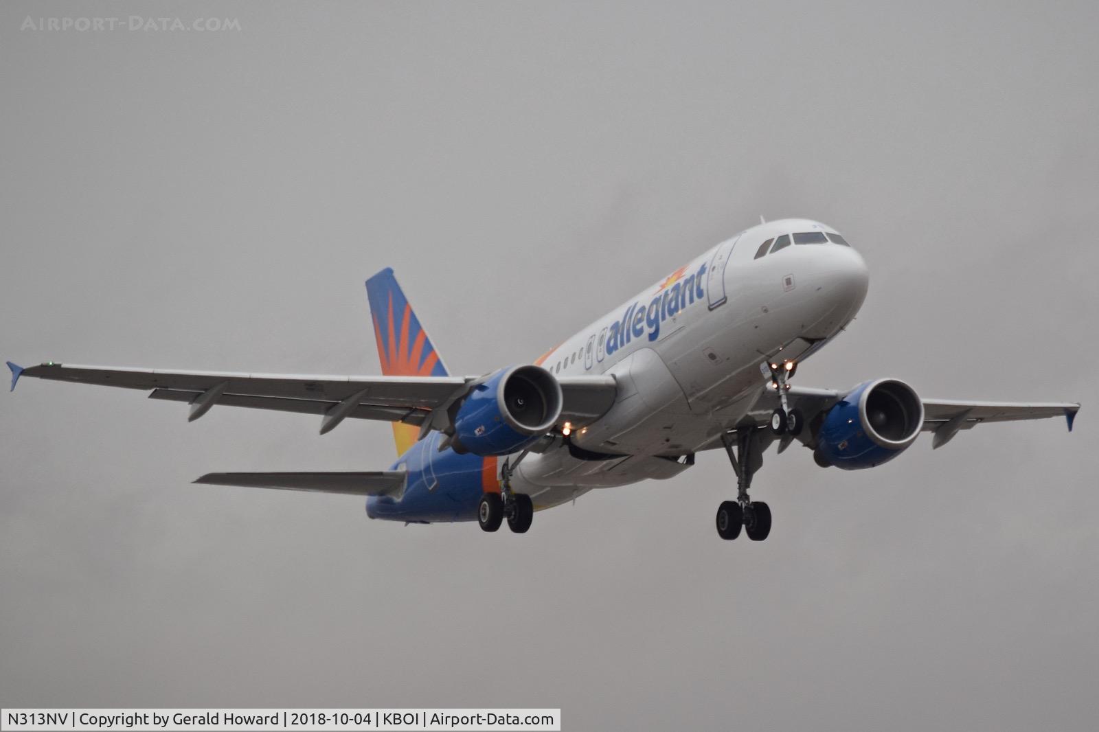 N313NV, 2004 Airbus A319-111 C/N 2300, Take off from RWY 28R.