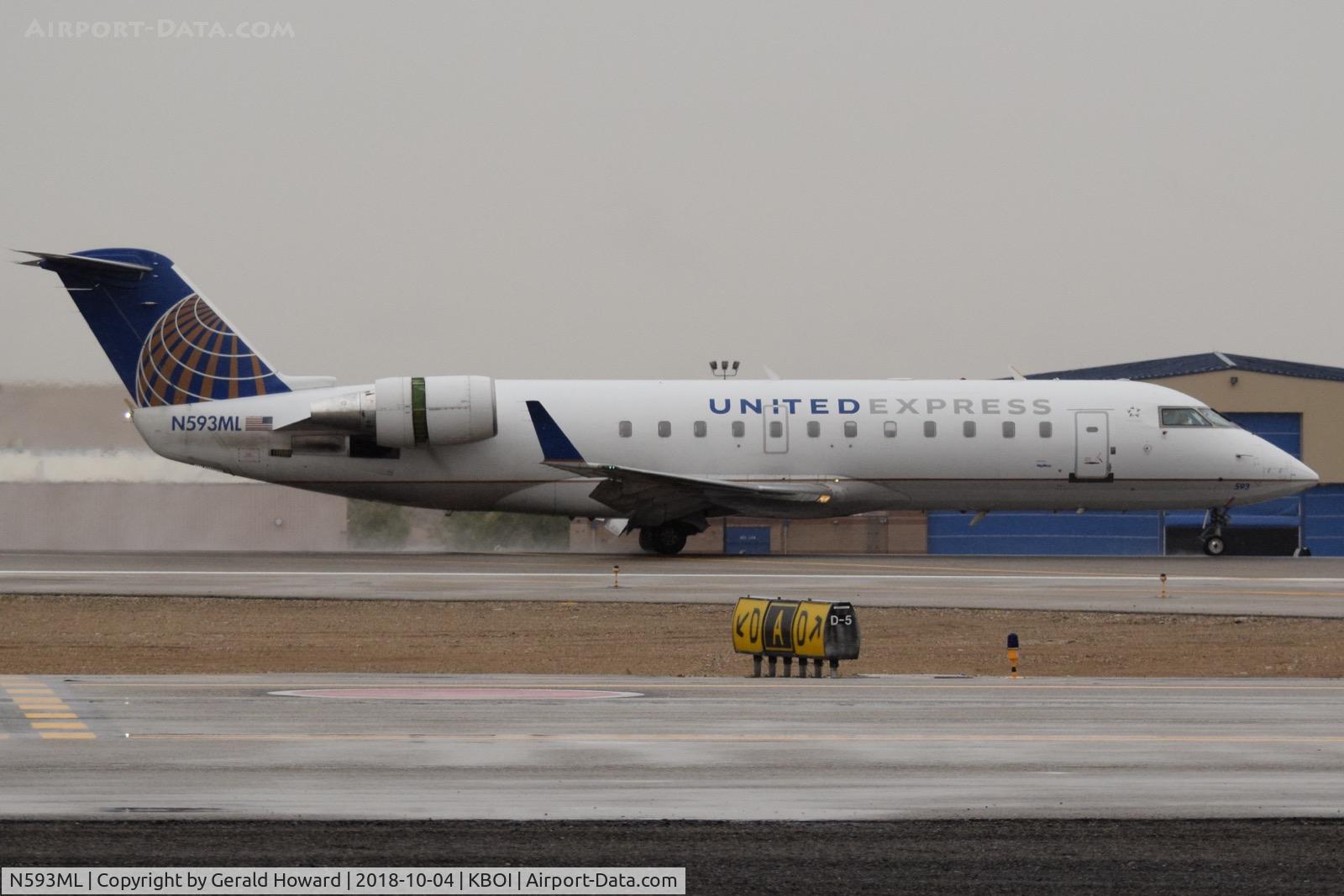 N593ML, 2001 Bombardier CRJ-200ER (CL-600-2B19) C/N 7465, Landing roll out on RWY 28R.