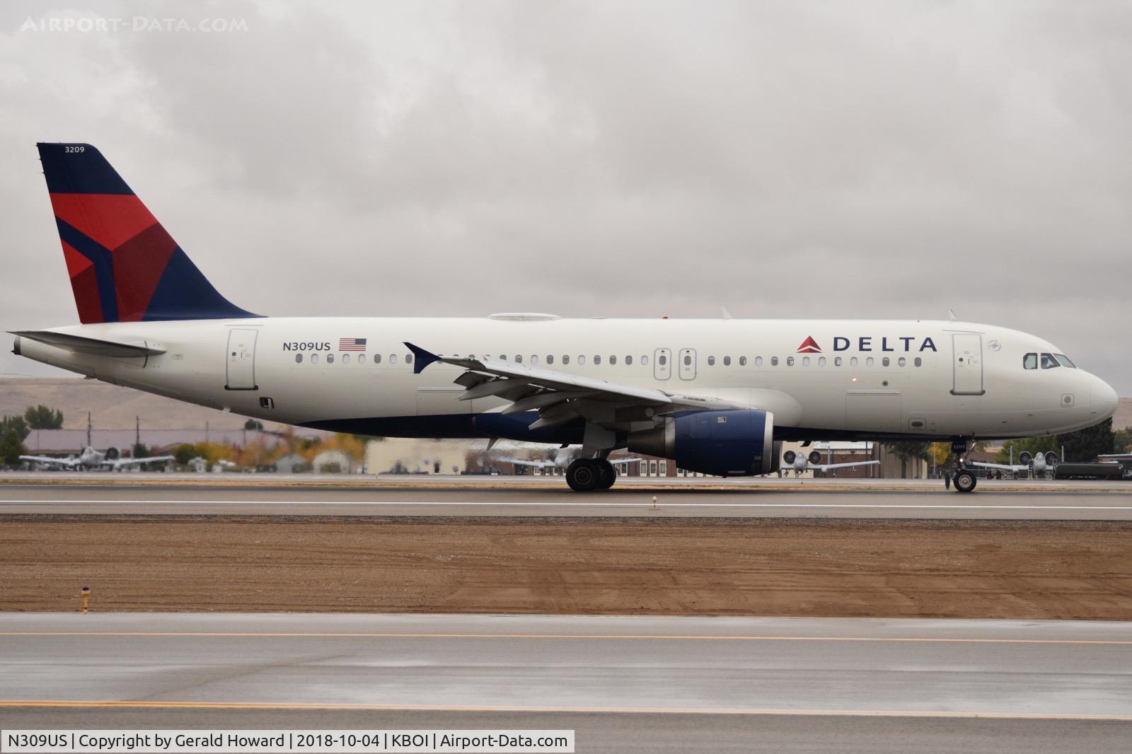 N309US, 1990 Airbus A320-211 C/N 118, End of landing roll out on RWY 28R.