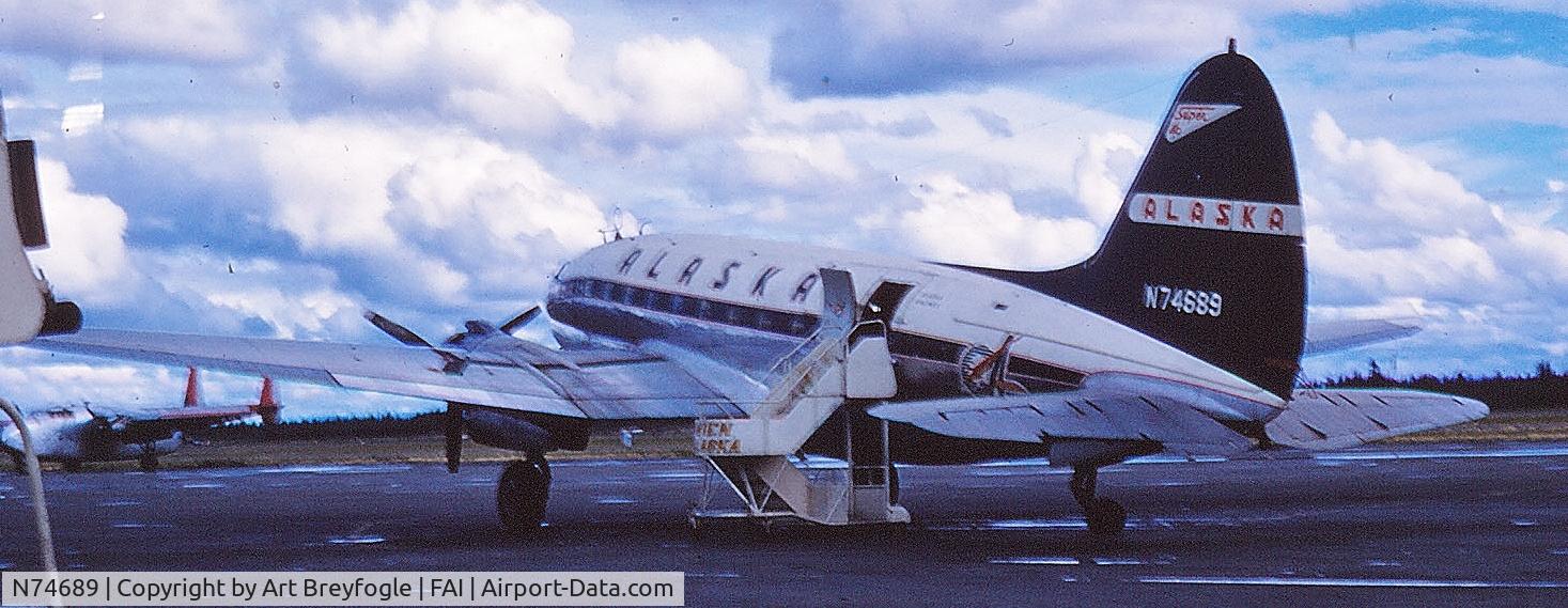 N74689, Curtiss C-46D Commando C/N 32975, Family took a trip to Alaska in 1960...I was only 11 at the time but already an airplane freak...Shot on the tarmac of the Fairbanks Airport...We took off for an ill fated trip to Dawson City, Yukon Territory and had to return due to weather 4 hrs. later