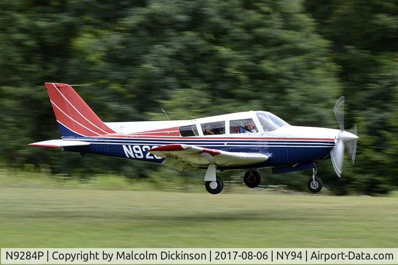 N9284P, 1968 Piper PA-24-260 C/N 24-4784, Comanche 260B landing on grass
