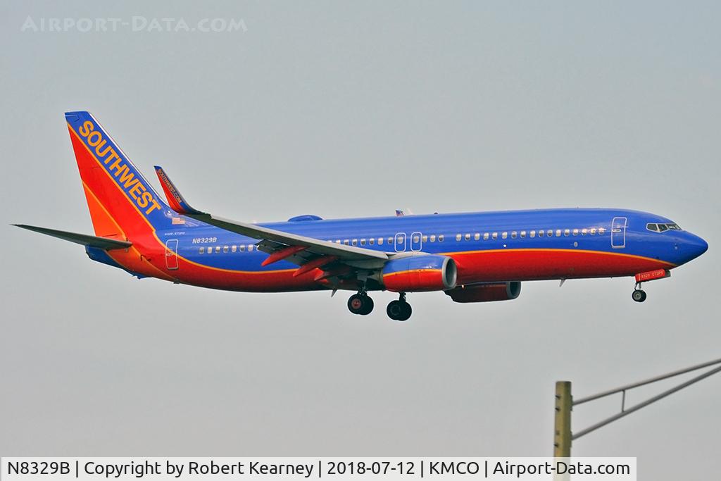 N8329B, 2012 Boeing 737-8H4 C/N 37006, On short final for r/w 18R