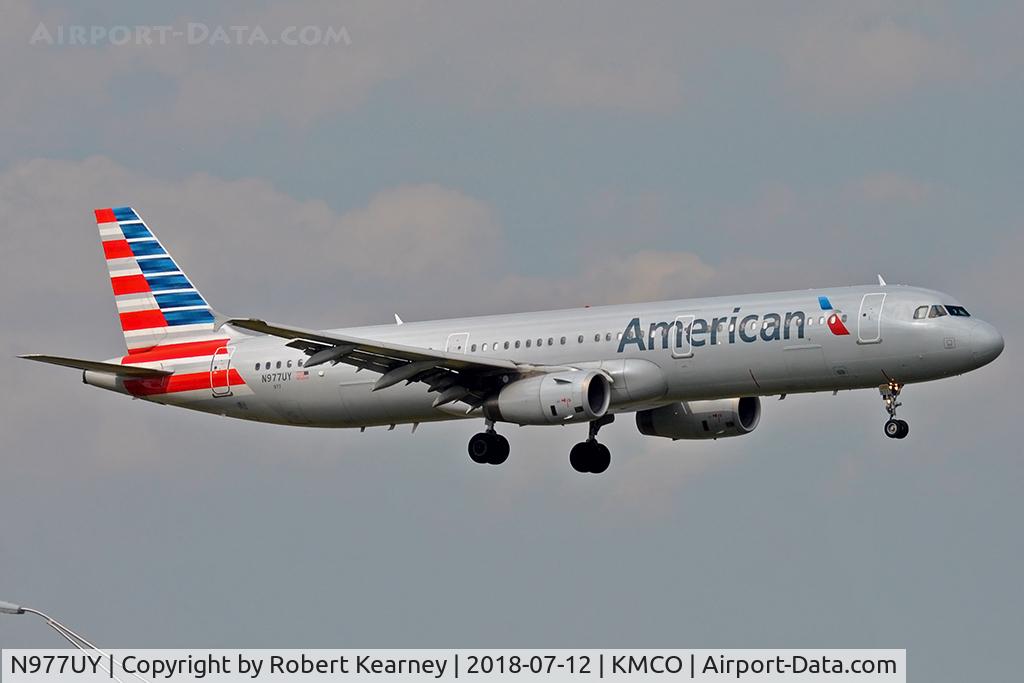 N977UY, 2012 Airbus A321-231 C/N 5409, On short final r/w 18R