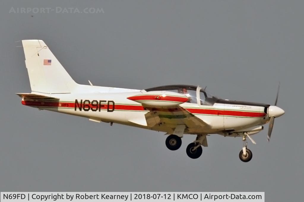 N69FD, 1984 SIAI-Marchetti F-260C C/N 727, On short final r/w 18R