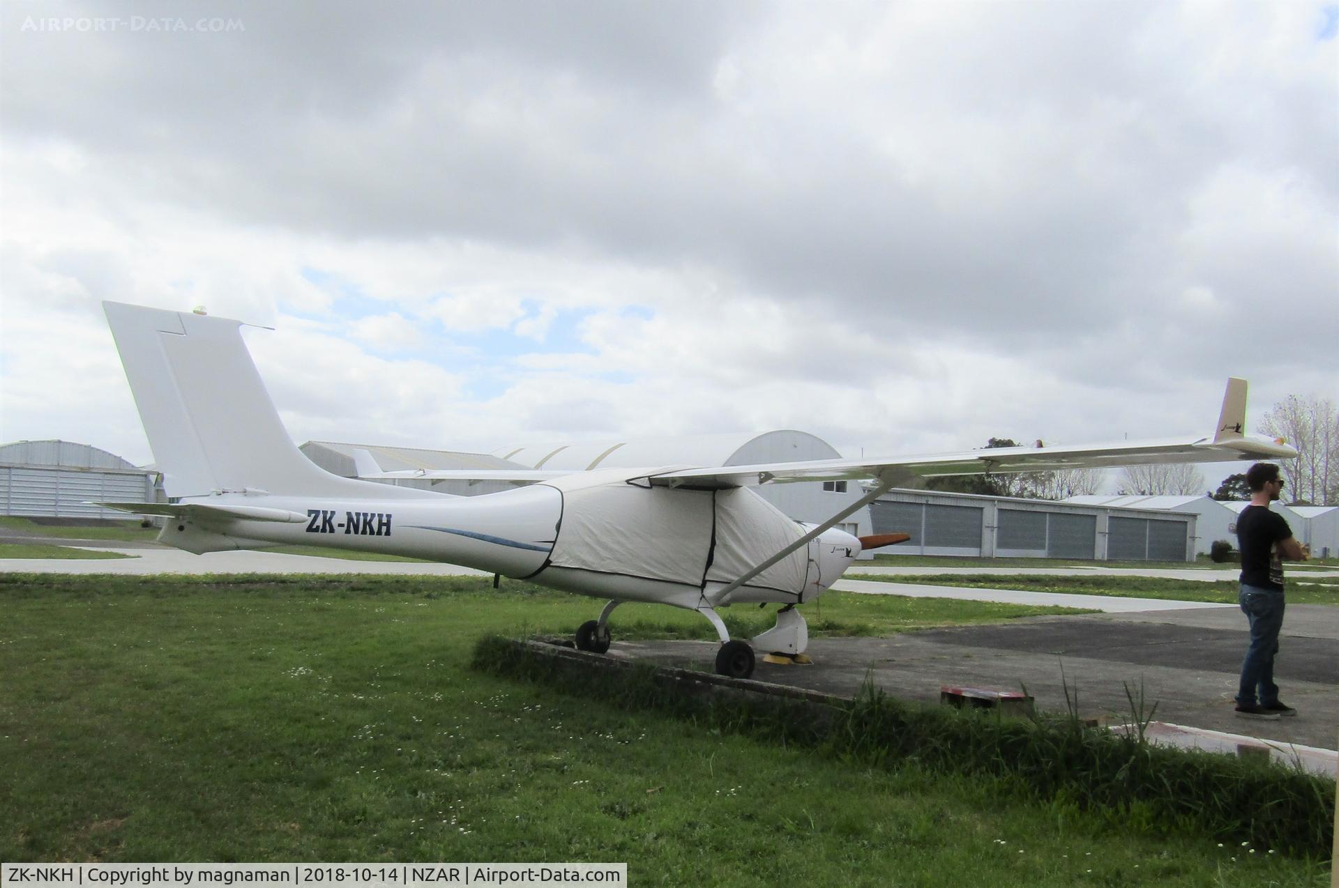 ZK-NKH, Jabiru J430 C/N 253, outside hangar on blustery day