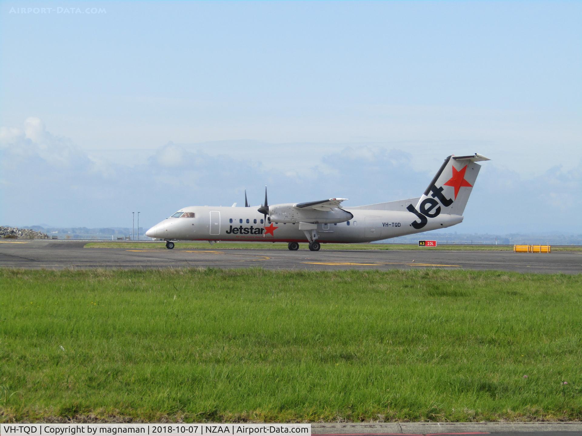 VH-TQD, 2004 De Havilland Canada DHC-8-315 Dash 8 C/N 598, leaving on a prop plane