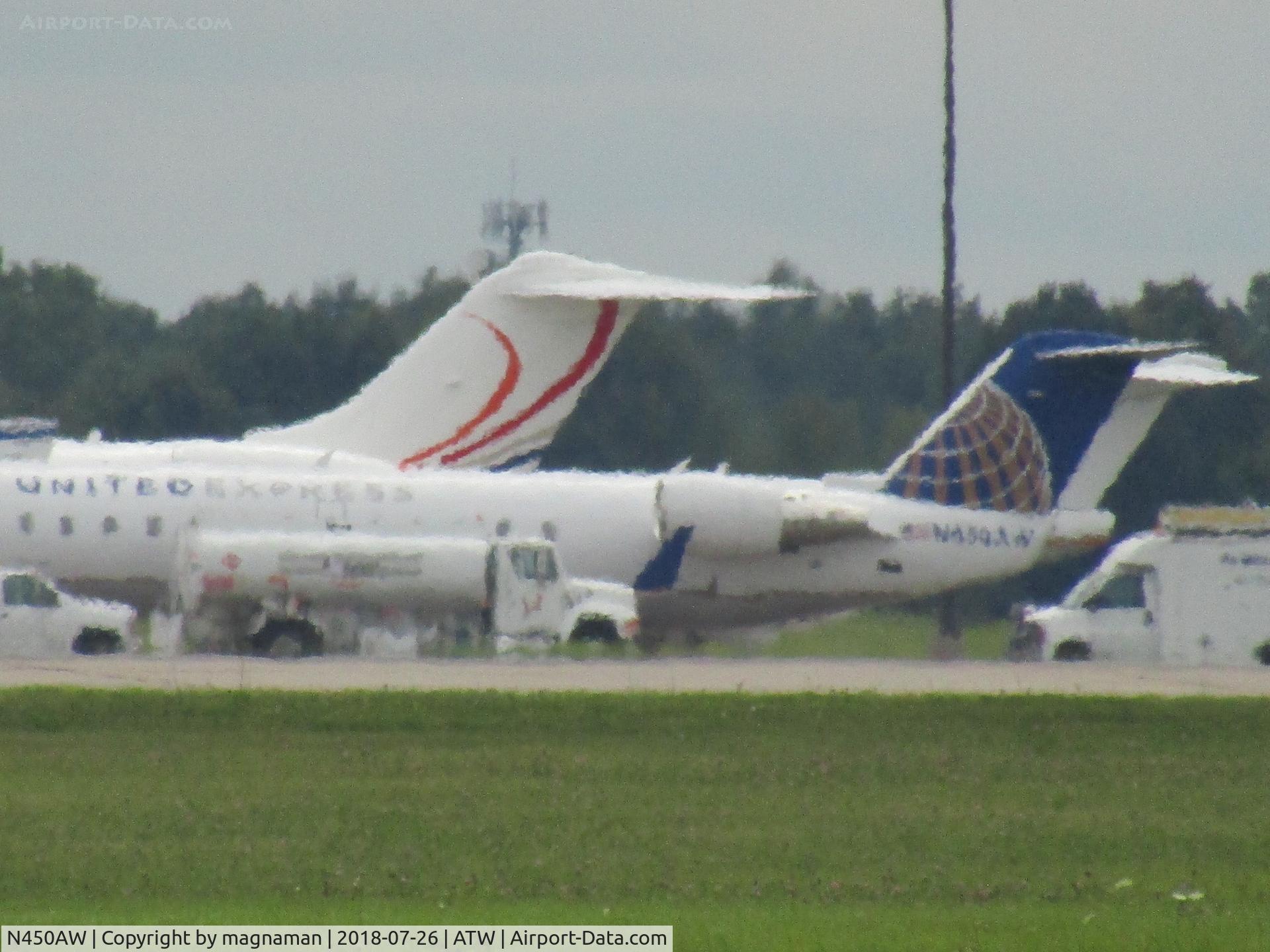 N450AW, 2003 Bombardier CRJ-200LR (CL-600-2B19) C/N 7823, long range across airfield