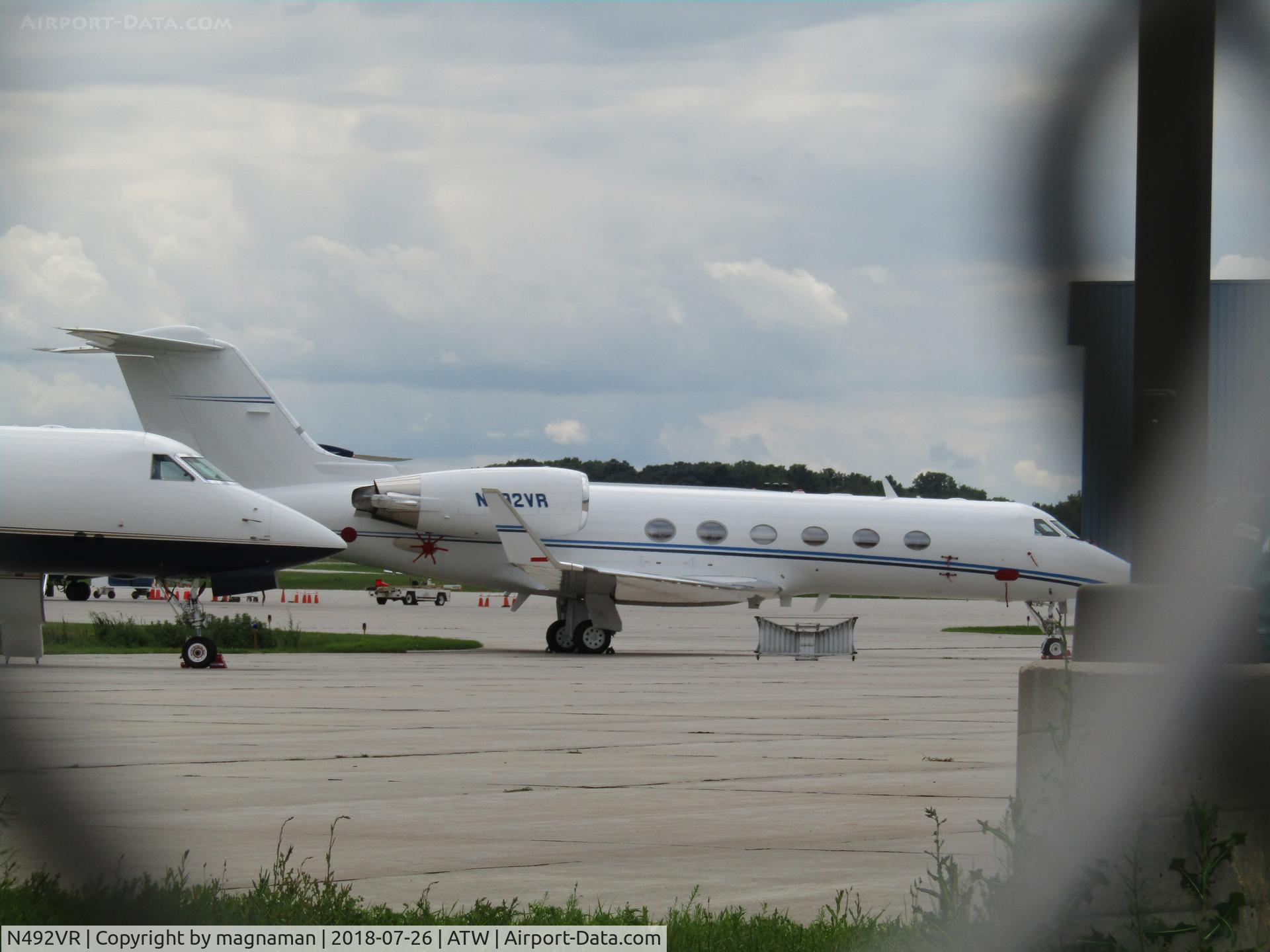 N492VR, 1999 Gulfstream Aerospace G-IV C/N 1392, through fence by gulfstream ramp