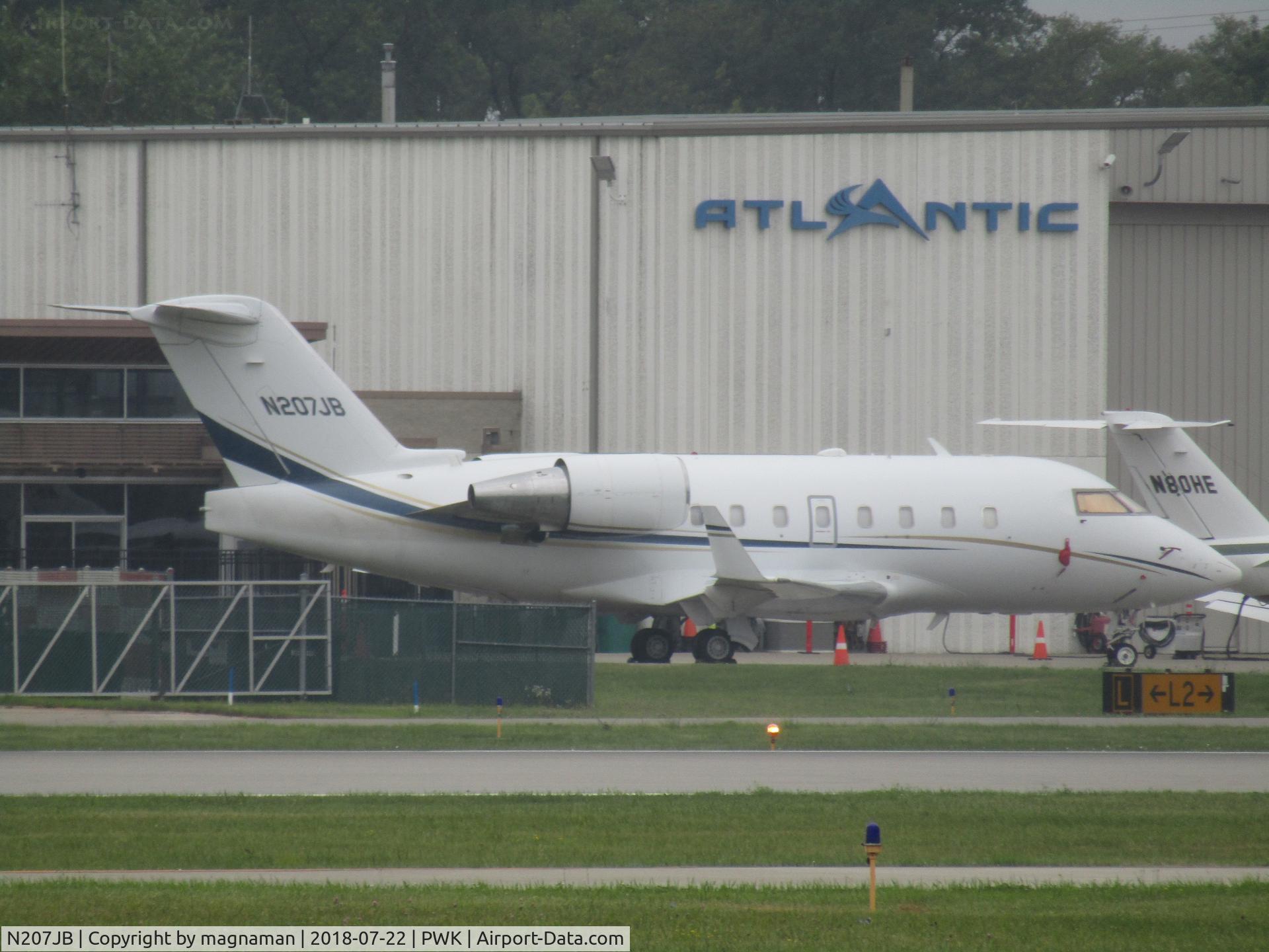 N207JB, 1996 Canadair Challenger 601-3R (CL-600-2B16) C/N 5194, across runway shot