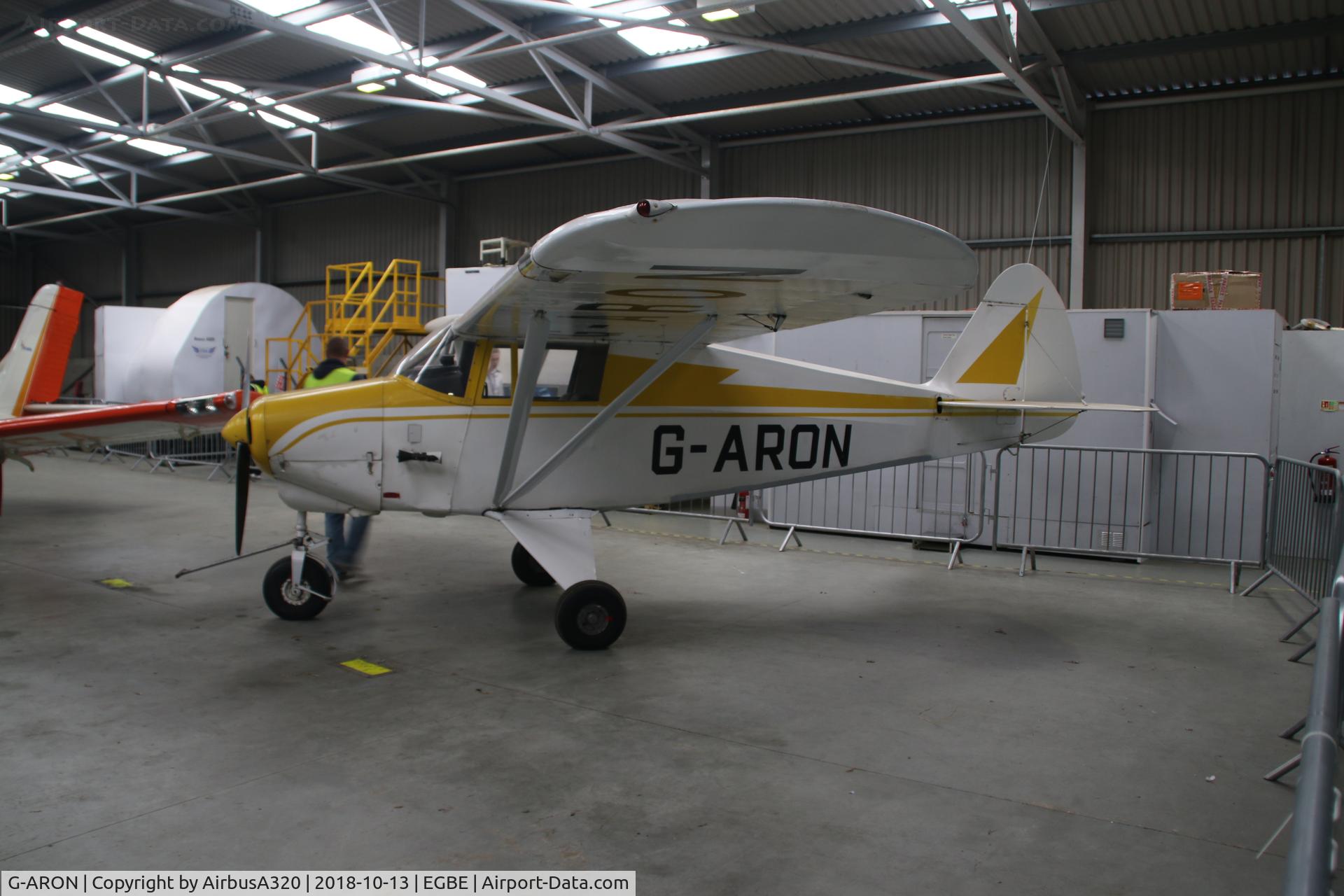 G-ARON, 1961 Piper PA-22-108 Colt Colt C/N 22-8822, Seen parked inside hangar