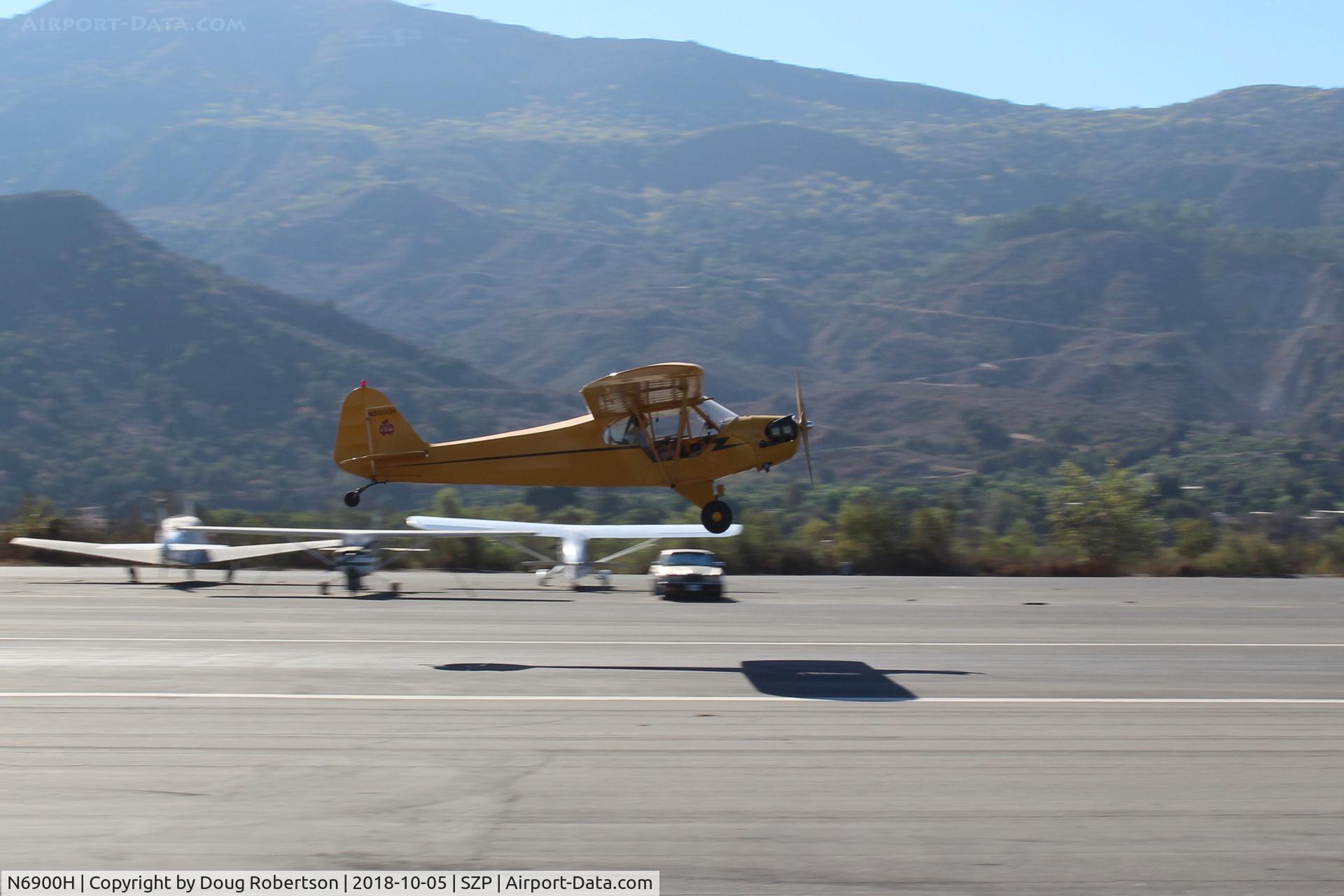 N6900H, 1946 Piper J3C-65 Cub Cub C/N 20129, 1946 Piper J3C-65 CUB, Lycoming O-290 135 Hp big upgrade by STC, takeoff climb Rwy 22