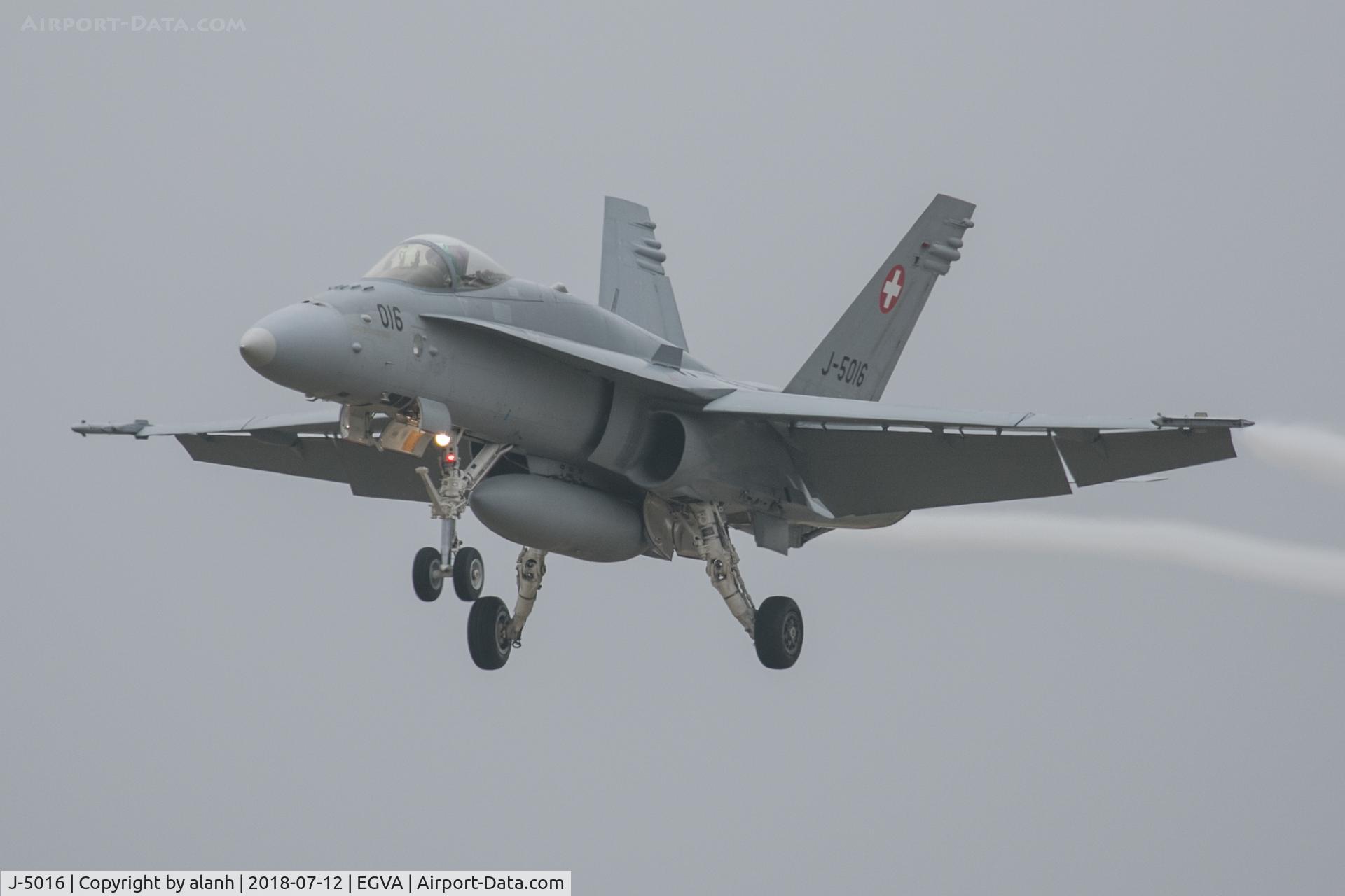 J-5016, 2001 McDonnell Douglas F/A-18C Hornet C/N 1363, Finals for RIAT 2018 with condensation trails spilling from the flaperons