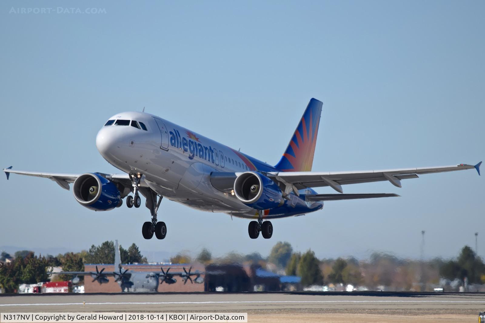 N317NV, 2005 Airbus A319-111 C/N 2477, Take off from RWY 10L.