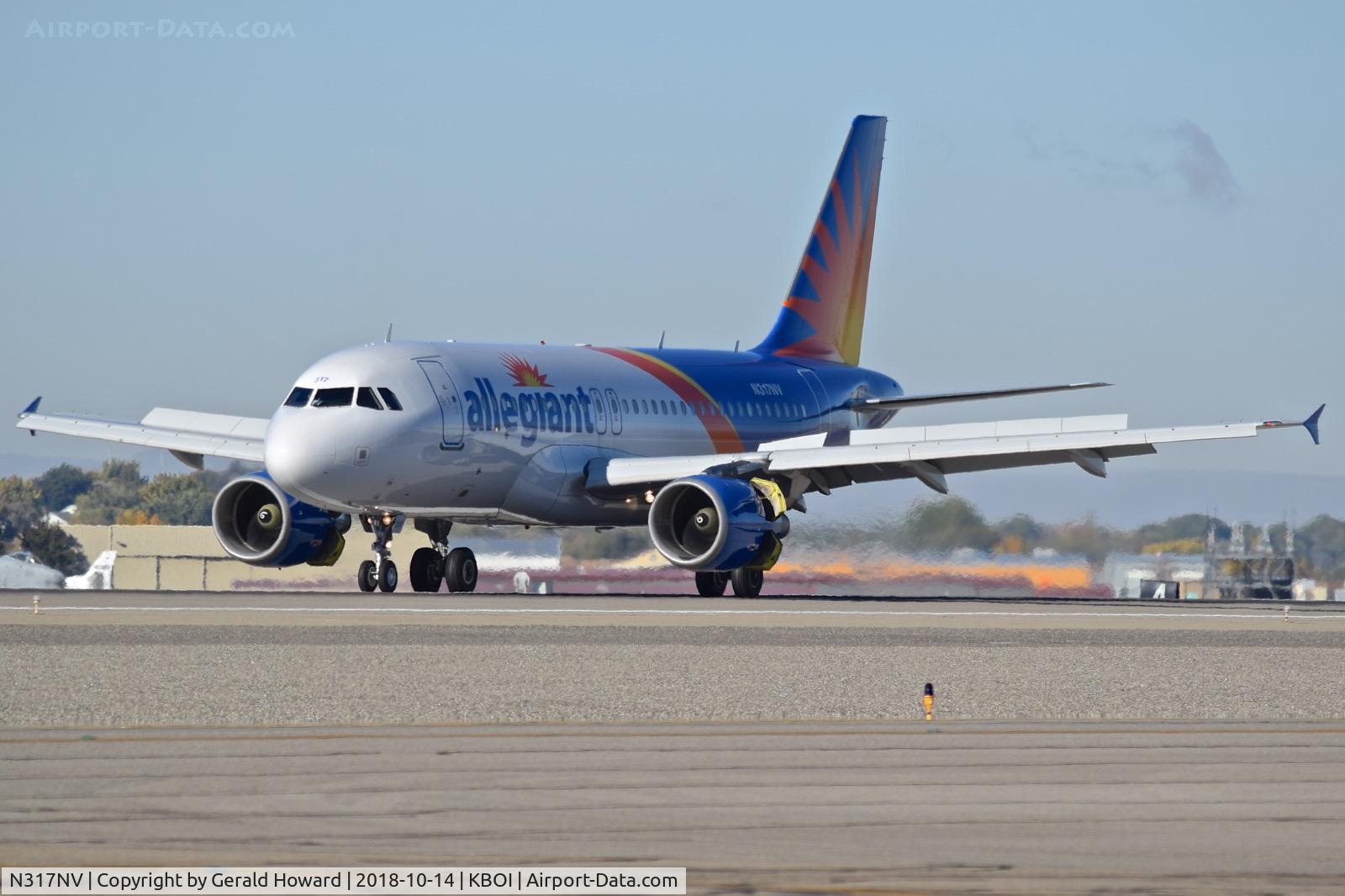 N317NV, 2005 Airbus A319-111 C/N 2477, Landing roll out on RWY 10L.