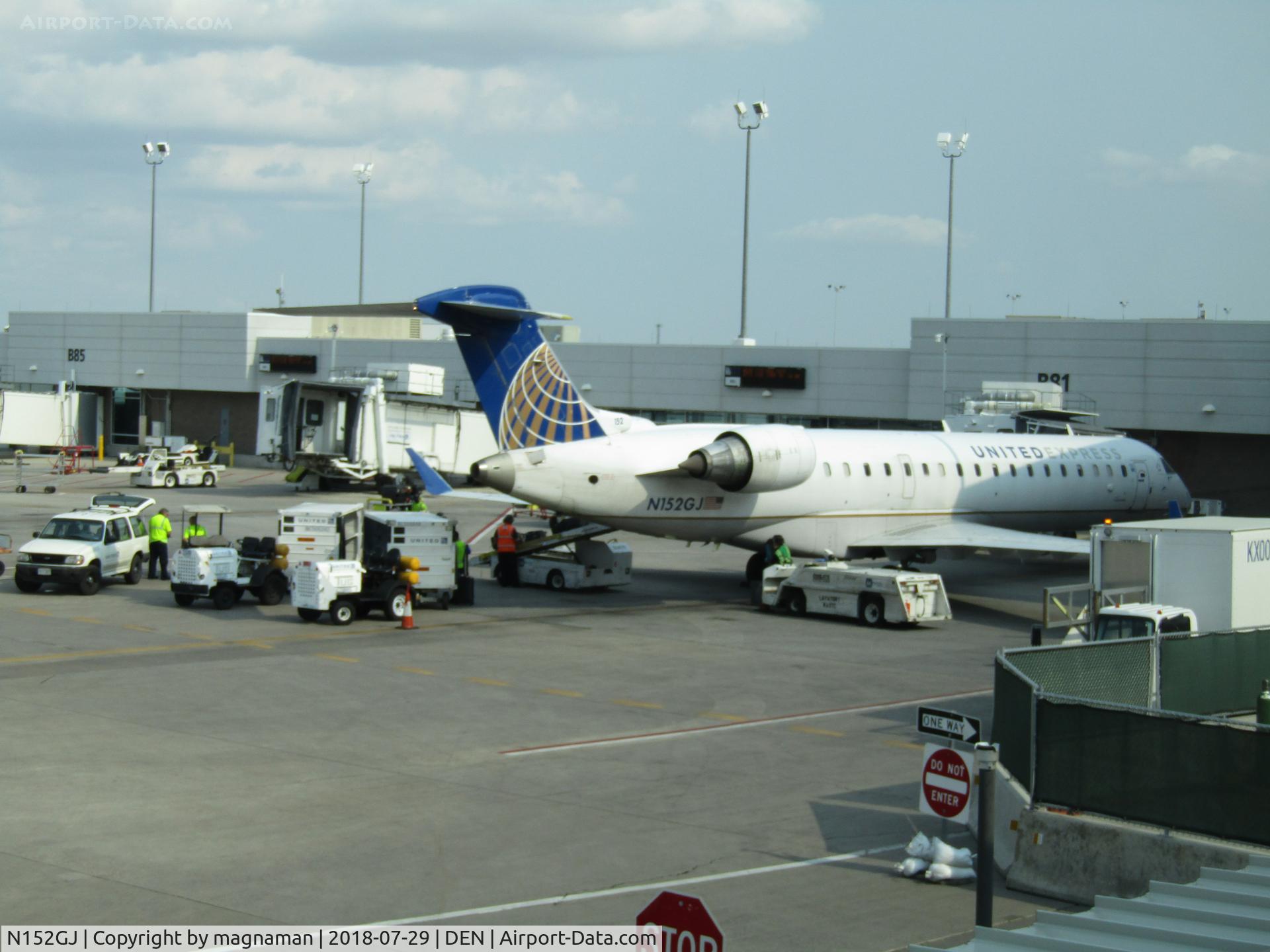 N152GJ, 2005 Bombardier CRJ-702 (CL-600-2C10) Regional Jet C/N 10218, on stand at denver