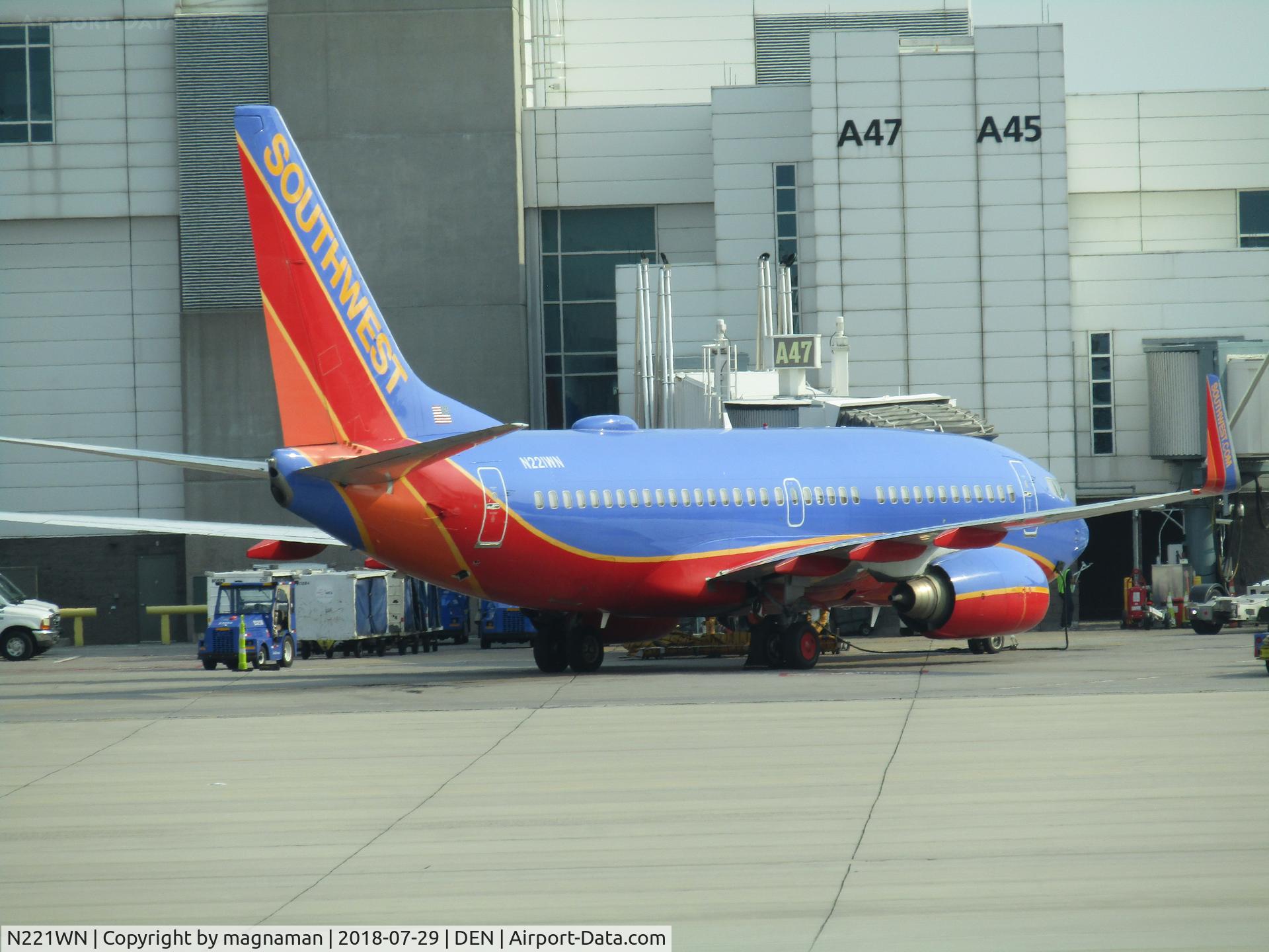 N221WN, 2005 Boeing 737-7H4 C/N 34259, on stand at DEN