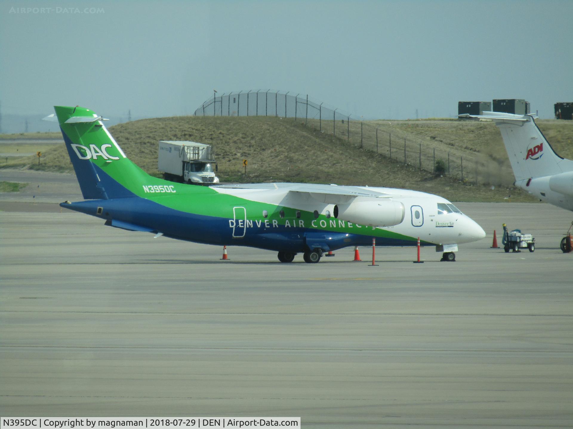 N395DC, 2001 Fairchild Dornier 328-300 328JET C/N 3178, on ramp at DEN