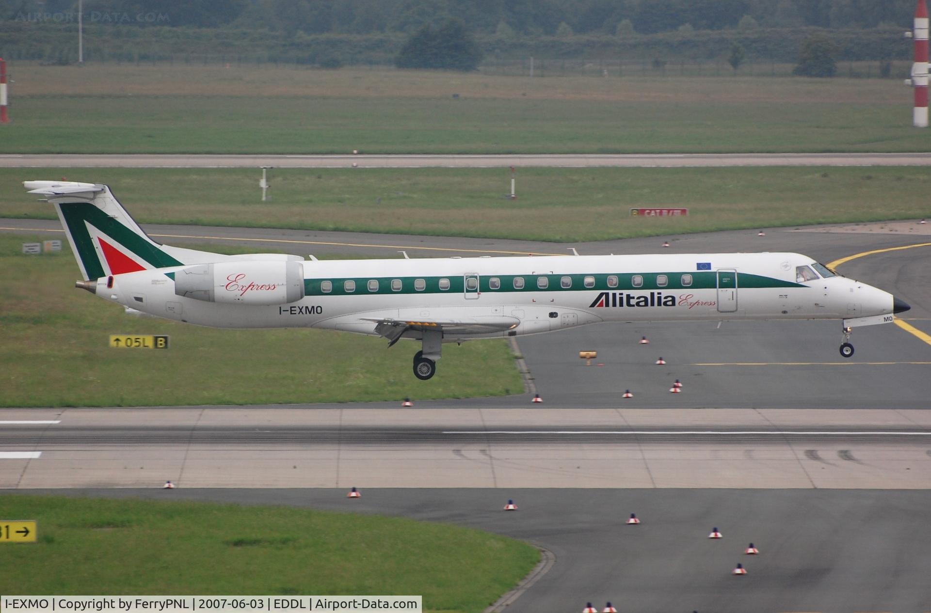 I-EXMO, 2000 Embraer ERJ-145LR (EMB-145LR) C/N 145299, Alitalia Express ERJ145 about to touch down