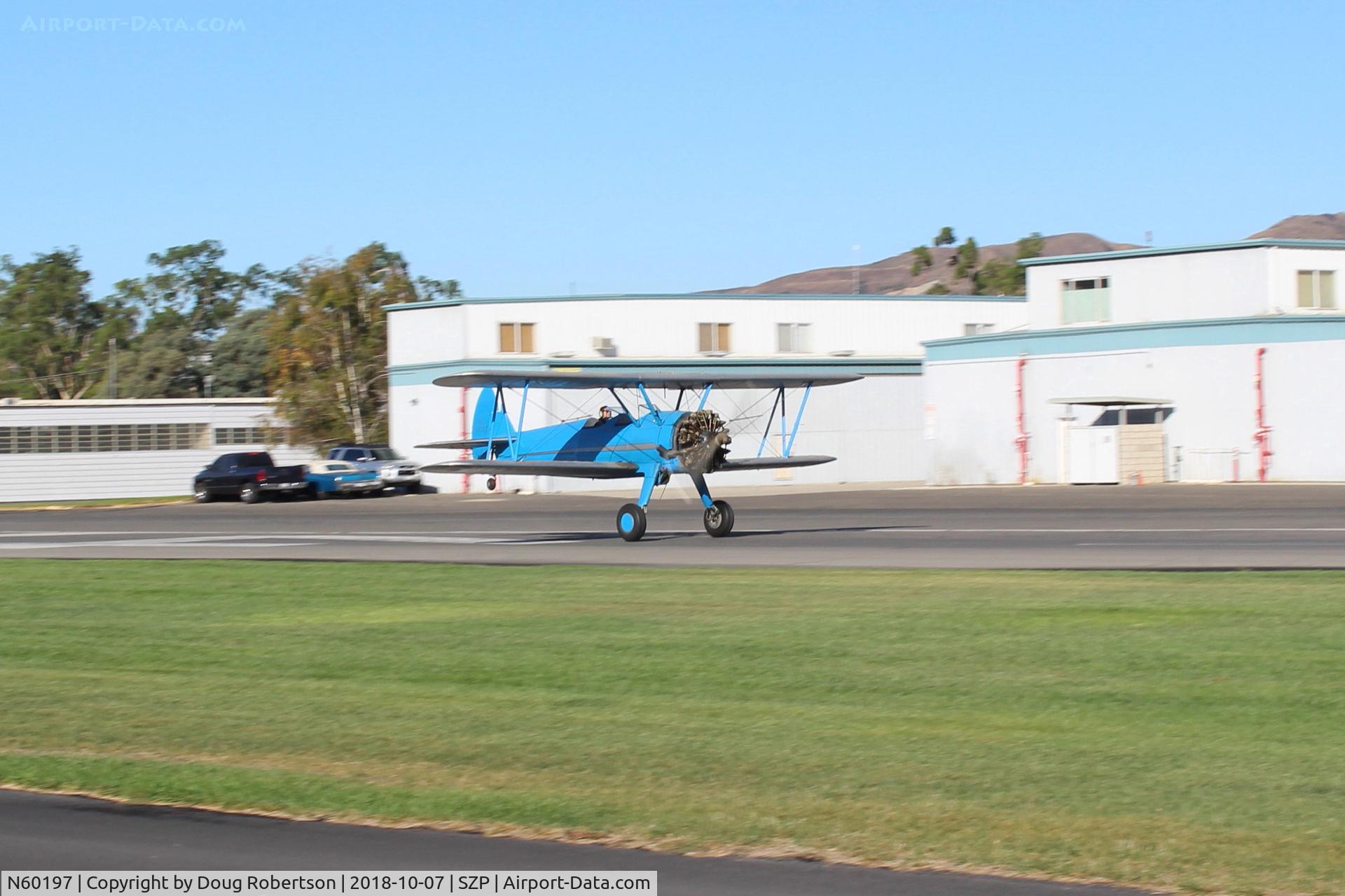 N60197, 1942 Boeing A75 C/N 75-3527, 1942 Boeing Stearman  A75, P&W R-985 Wasp Jr. 450 Hp upgrade, Restricted class. Landing roll Rwy 04