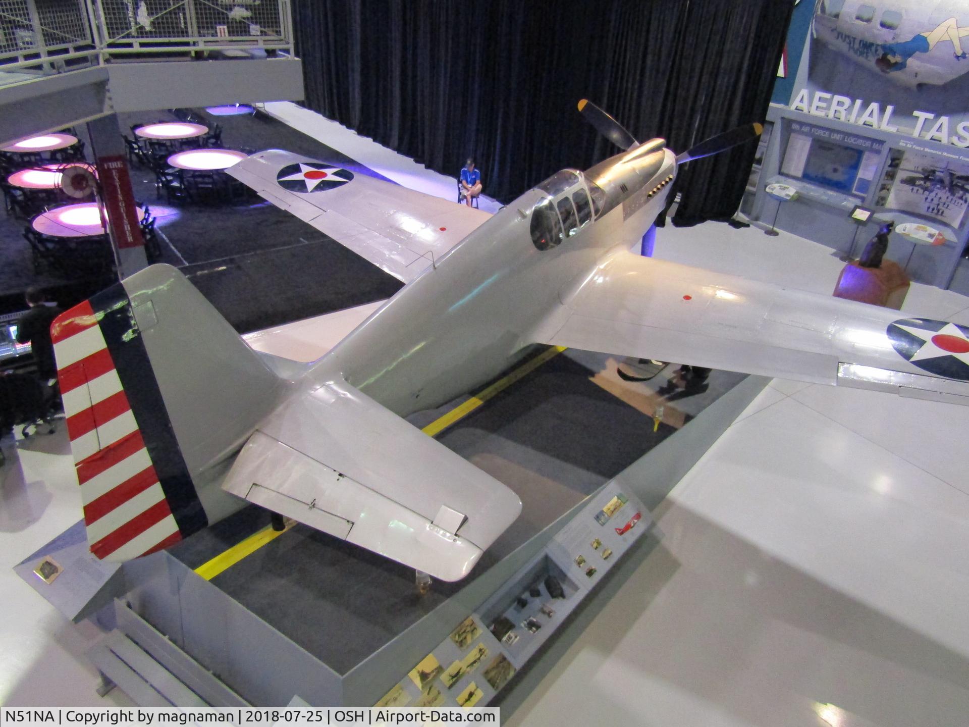 N51NA, 1941 North American XP-51 Mustang C/N 41-038, devoid of markings in main hall at EAA musuem