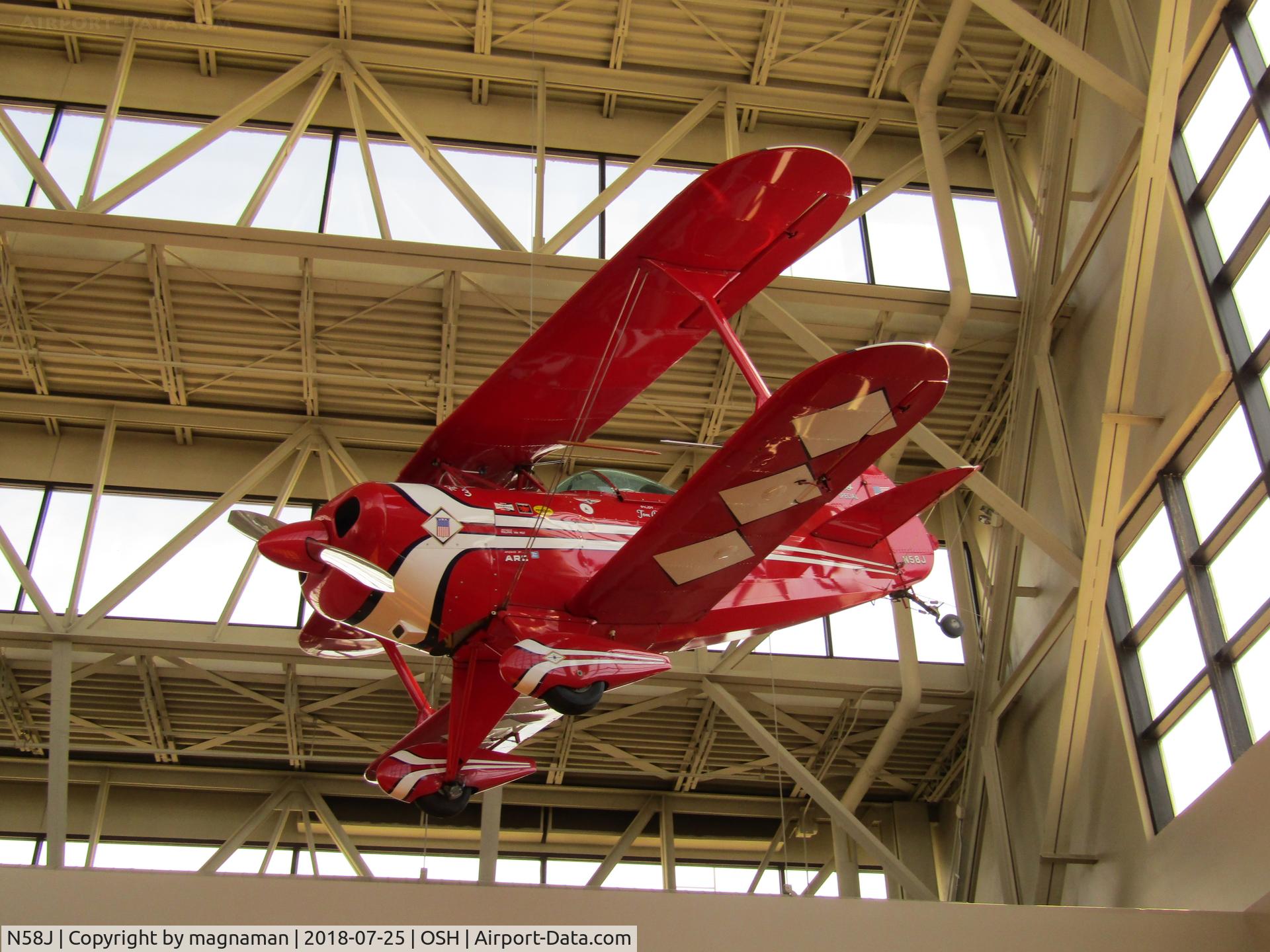 N58J, 1971 Pitts P-7 C/N 107, another lobby exhibit at EAA