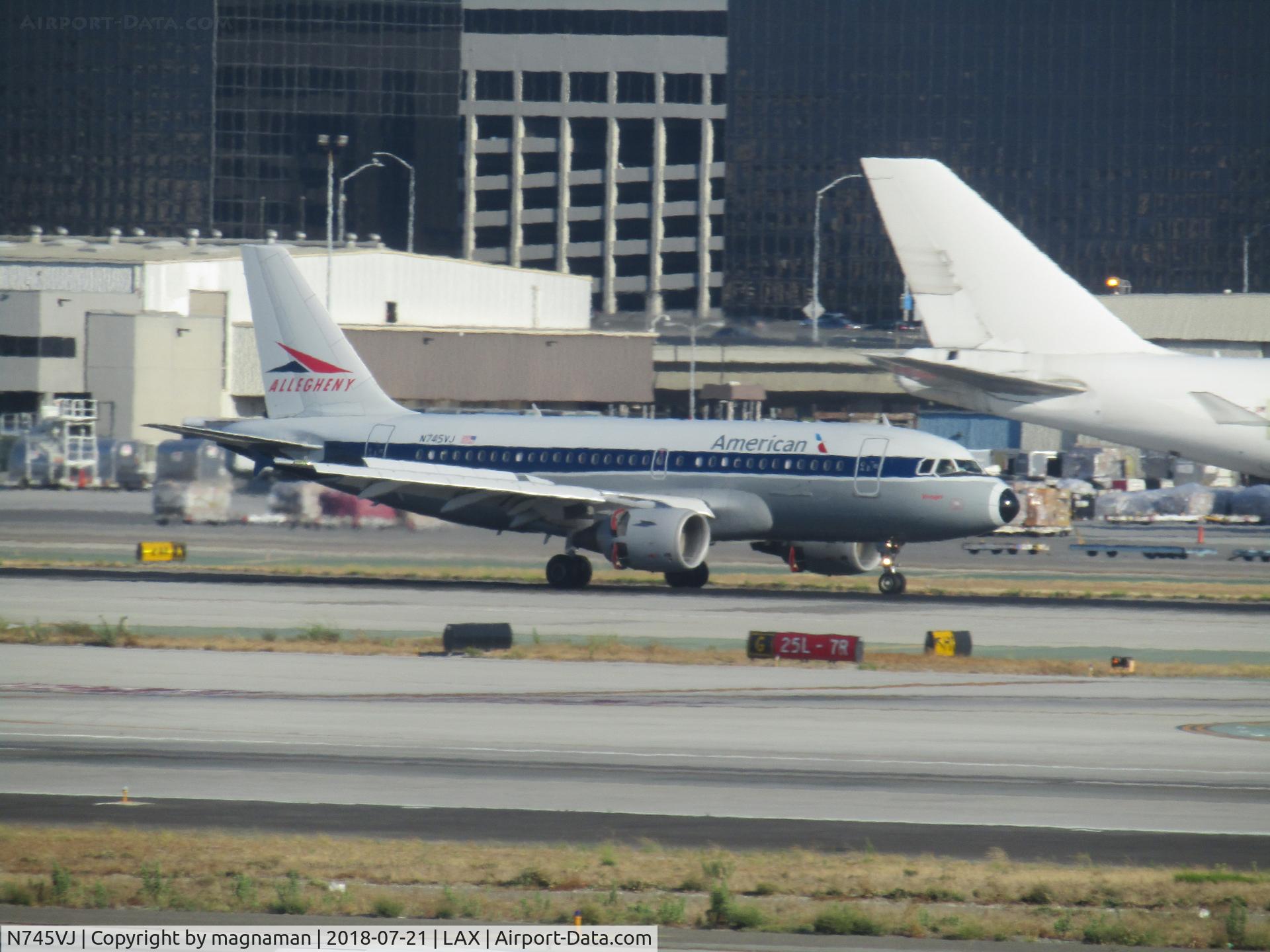 N745VJ, 2000 Airbus A319-112 C/N 1289, landing at LAX