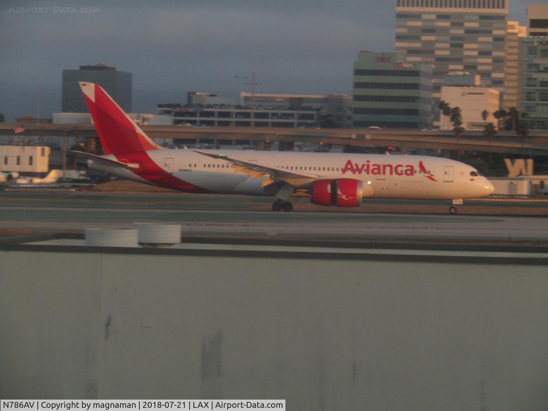 N786AV, 2015 Boeing 787-8 Dreamliner Dreamliner C/N 37508, landing in dusk light through terminal window -bit fuzzy but good airline!