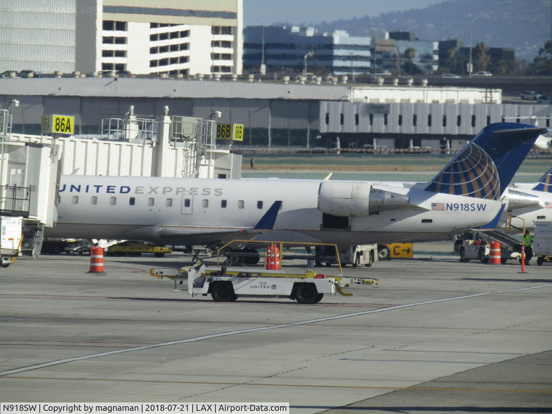 N918SW, 2002 Bombardier CRJ-200LR (CL-600-2B19) C/N 7645, on stand at LAX