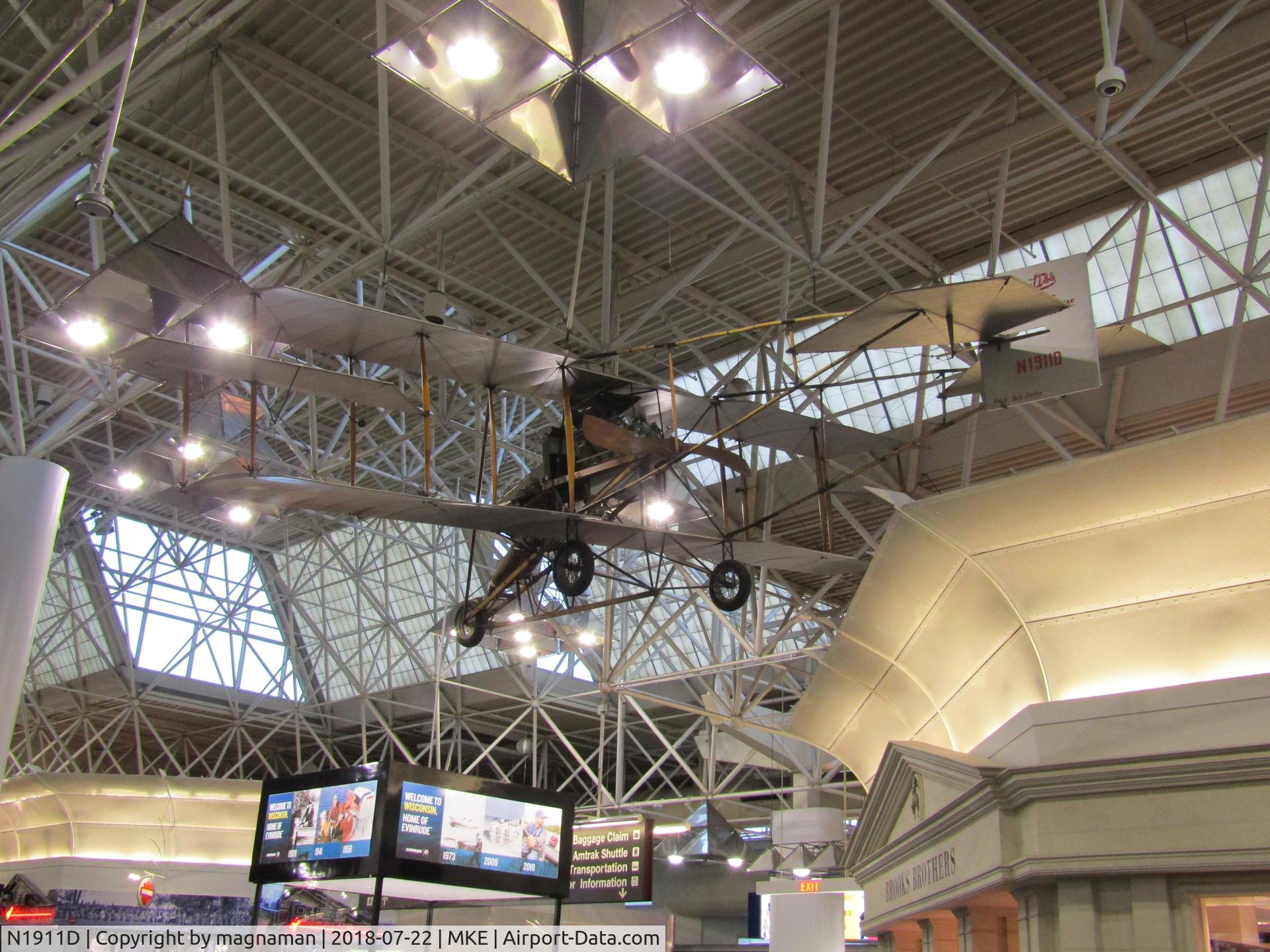 N1911D, 1974 Curtiss Pusher E8-90 Replica C/N C3, in terminal at Milwaukee