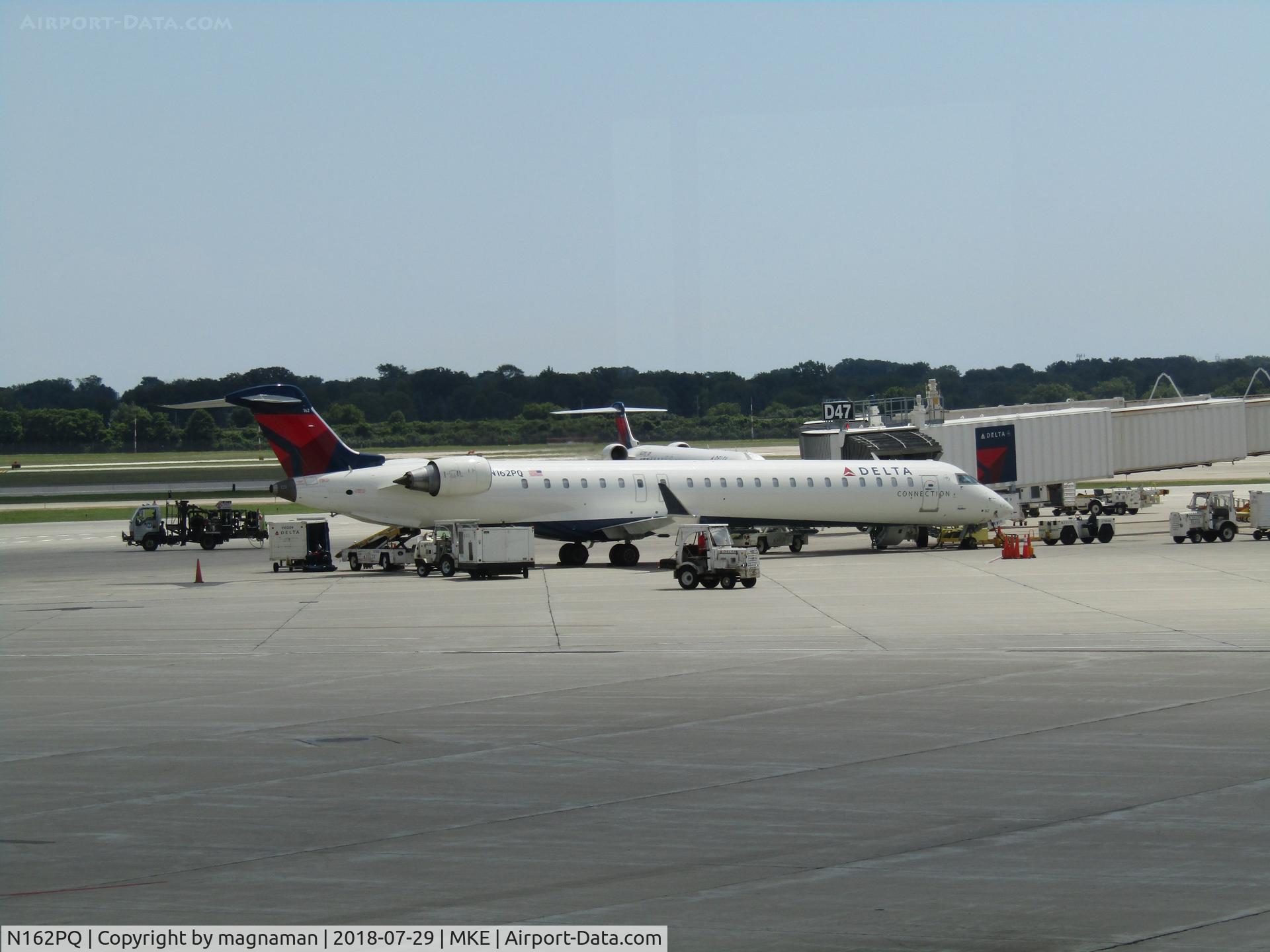 N162PQ, 2008 Bombardier CRJ-900ER (CL-600-2D24) C/N 15162, on stand at MKE