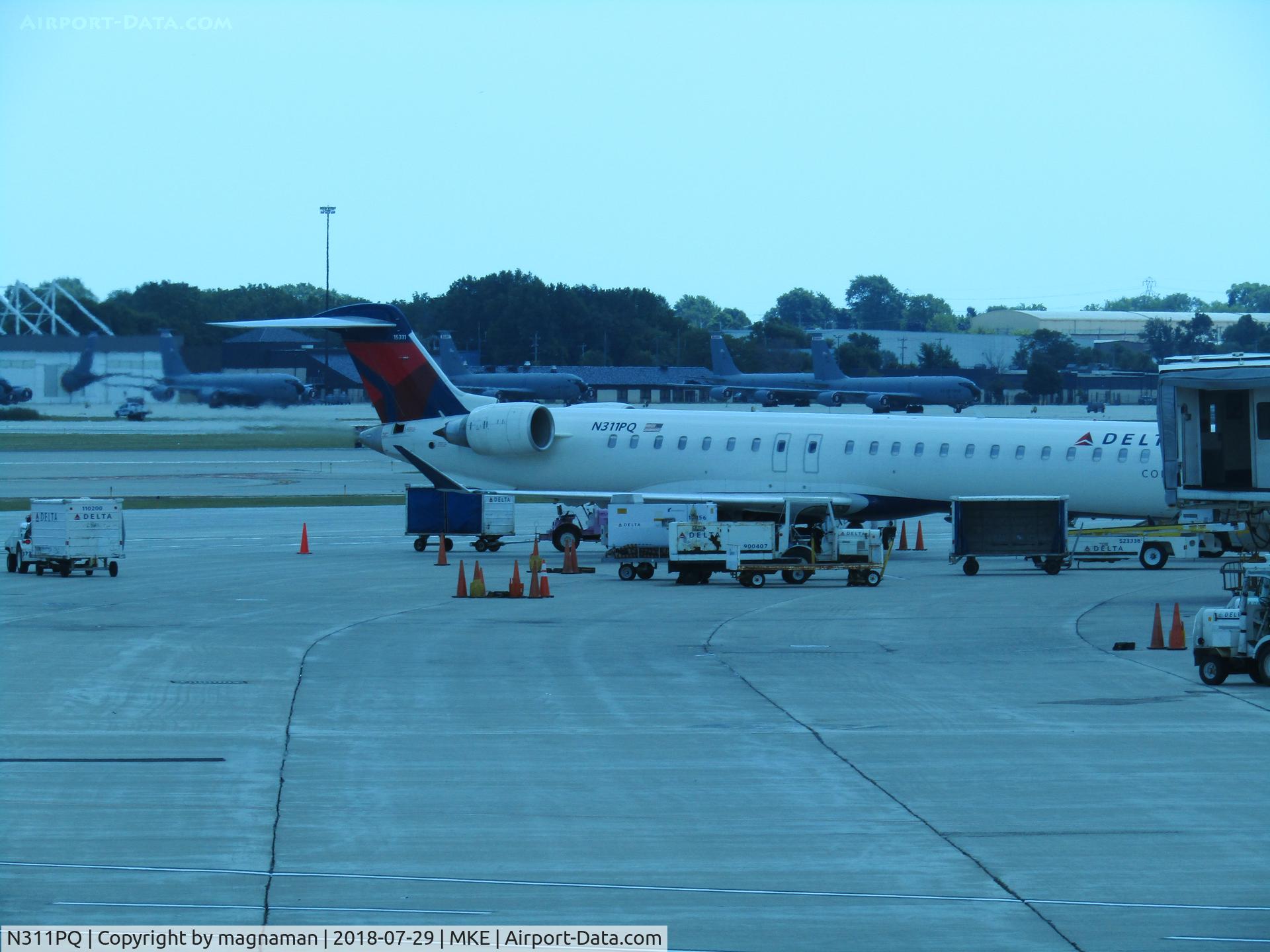 N311PQ, 2014 Bombardier CRJ-900 (CL-600-2D24) C/N 15311, from inside terminal