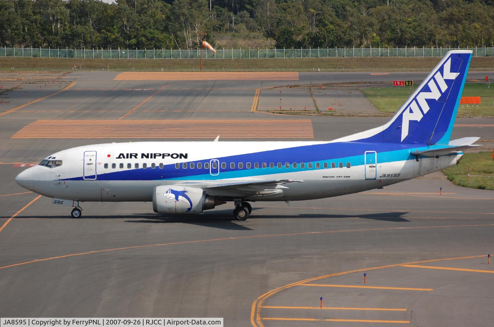 JA8595, 1997 Boeing 737-54K C/N 28461, B735 taxying to its gate.